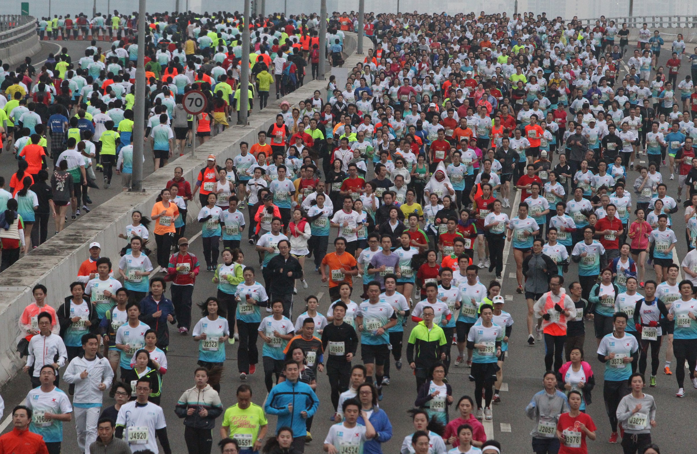 The Hong Kong Marathon has reached saturation point with about 73,000 runners expected for next year's event. Photo: Felix Wong 