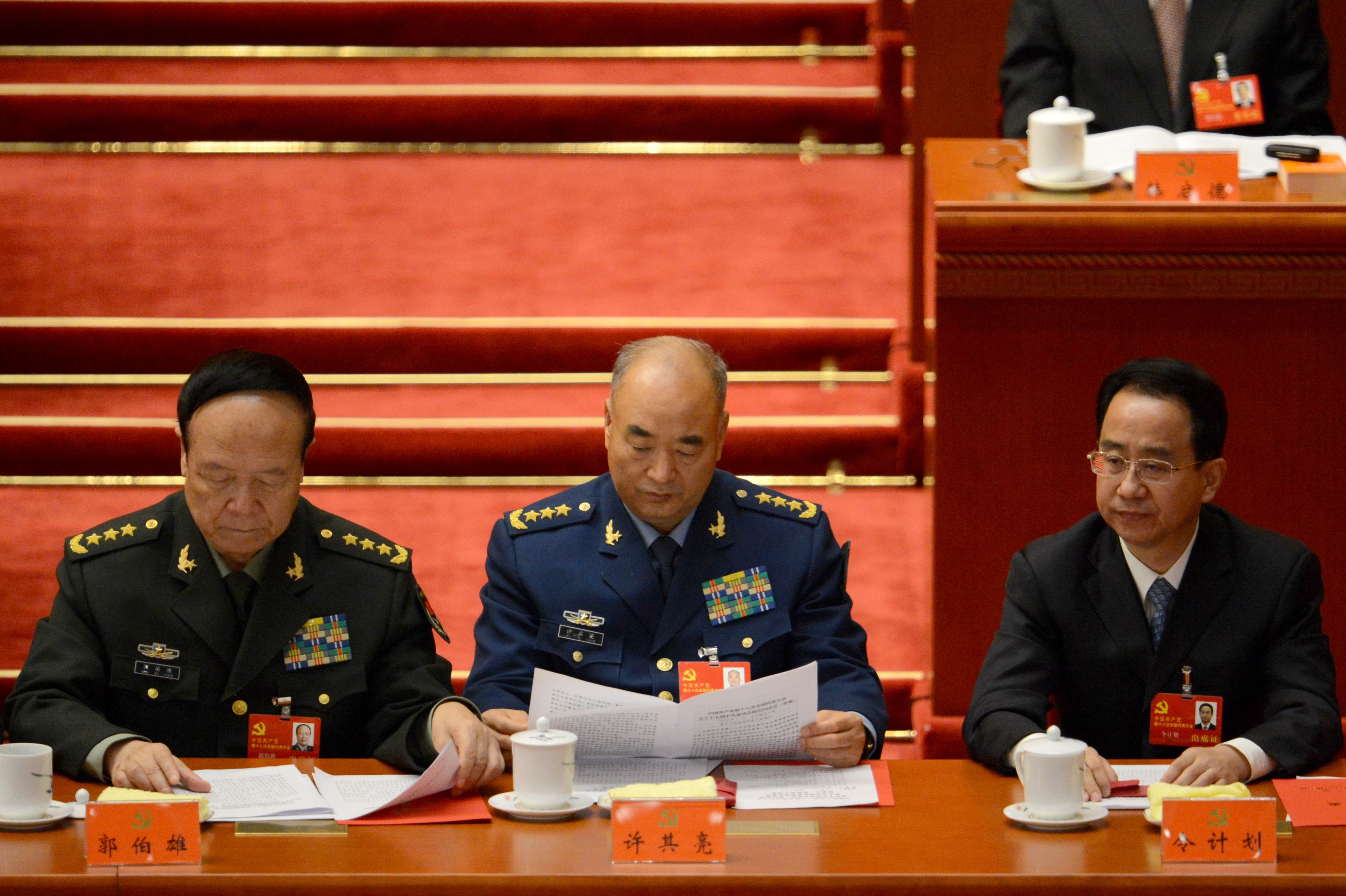 Ling Jihua next to generals Guo Boxiong, Xu Qiliang at the closing of the 18th Communist Party Congress at the Great Hall of the People in Beijing on 14 November 2012. Photo: AFP