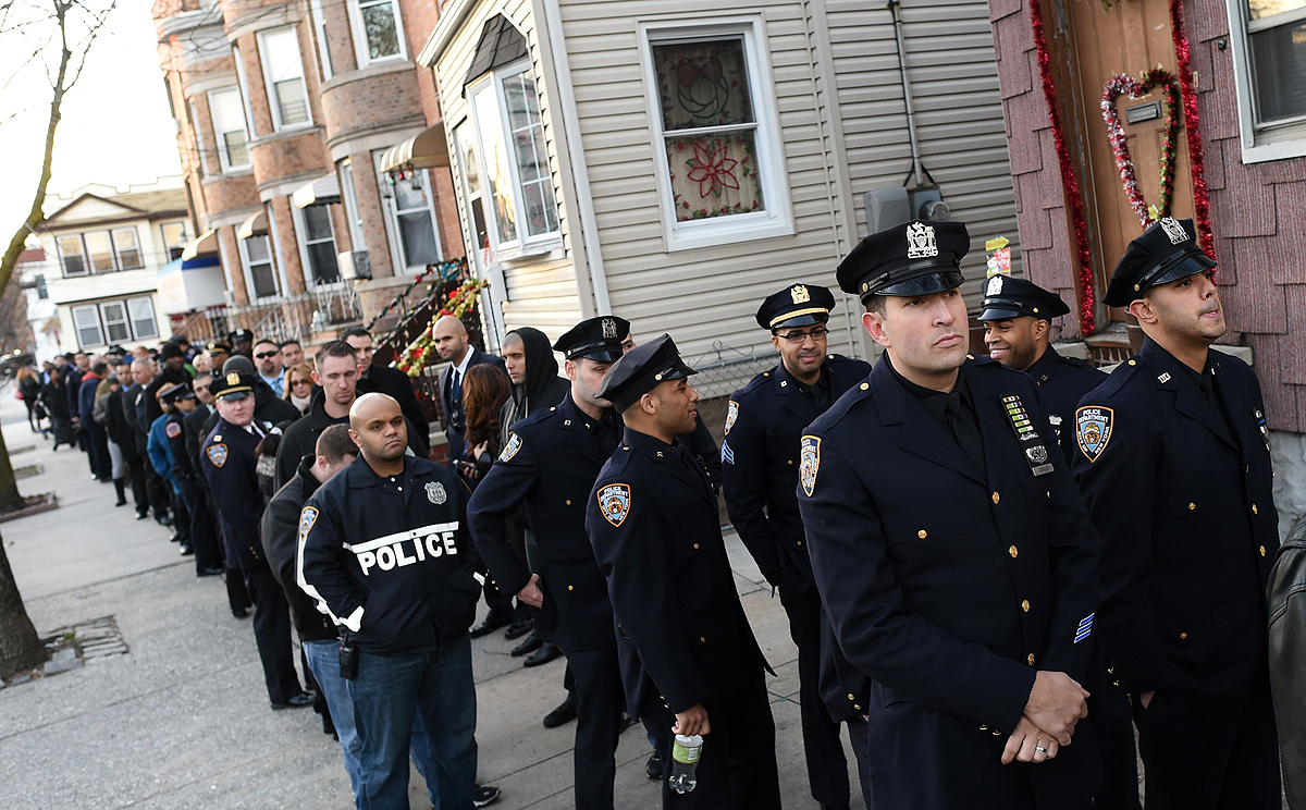 Officers line up for the wake for NYPD officer Rafael Ramos on Friday. Photo: AFP