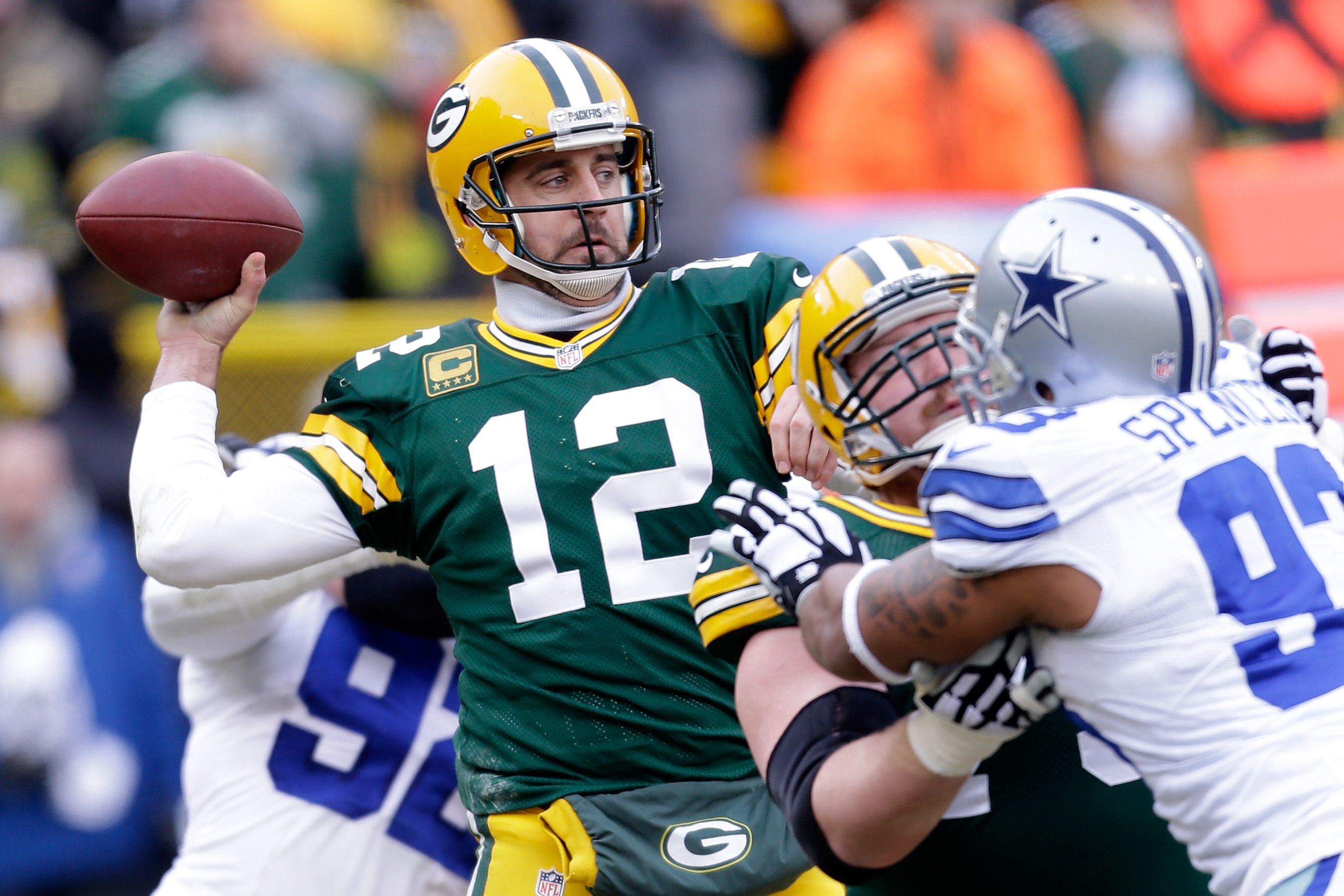 Packers quarterback Aaron Rodgers  looks to pass in the second quarter against the Cowboys. Photo: AFP
