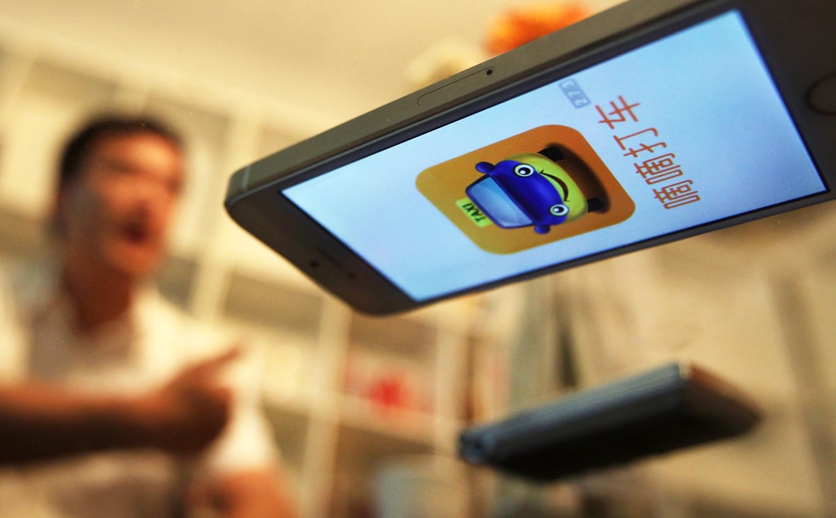 Didi Dache has become China's most popular mobile app to request a taxi ride. Photo: Simon Song