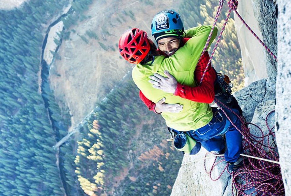 Tommy Caldwell and Kevin Jorgeson hug atop the El Capitan. Photo: Big Up Productions