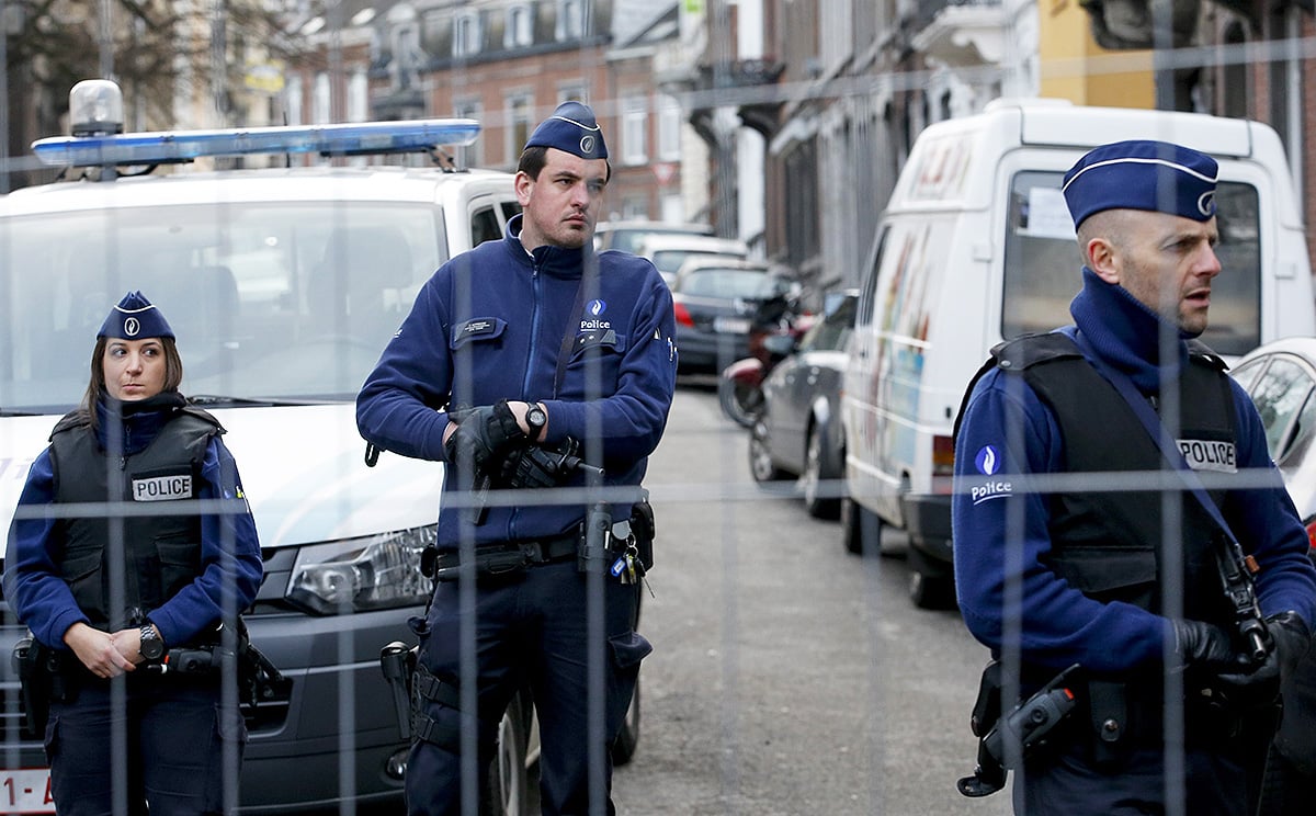 Police block the street of Colline in Verviers, eastern Belgium, where an anti terrorist operation took place. Photo: EPA