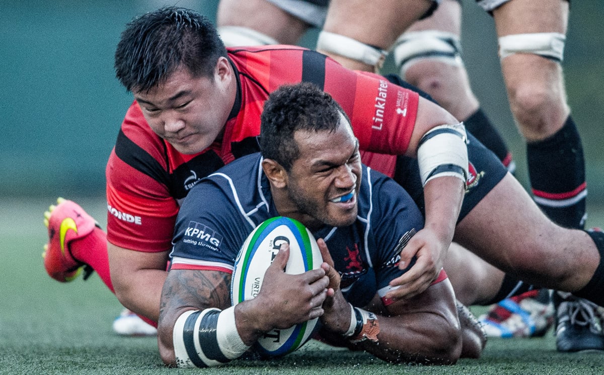 Valley’s Leon Wei Hon-sum gets to grips with Lex Kaleca of HK Scottish earlier this Premiership season. The teams meet again on Saturday with everything to play for as the playoffs near. Photos: HKRFU