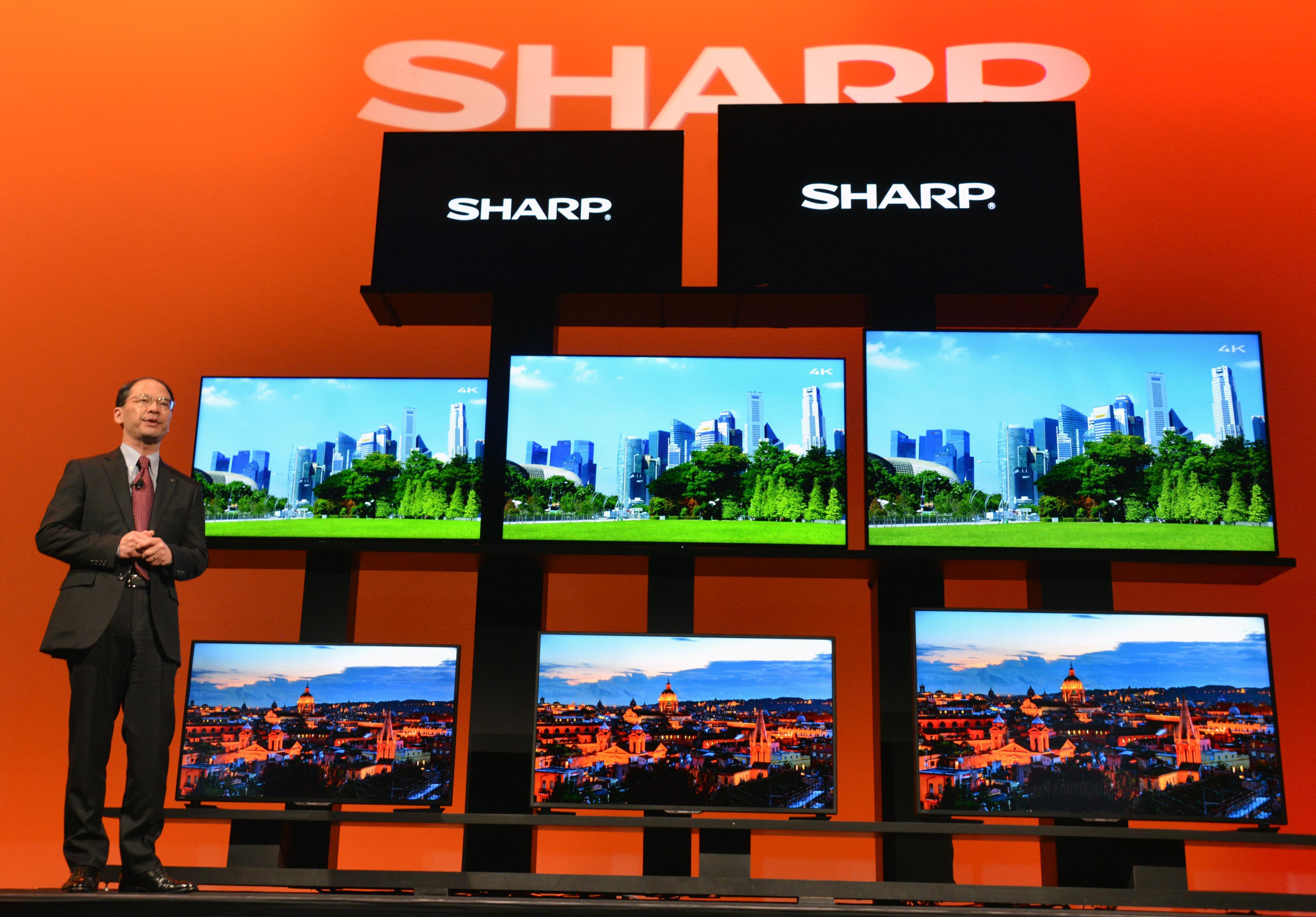 Sharp Corp of Japan unveils its new high-definition TV as the company in Tokyo issued a profit warning while its shares slid to a 2-year low. Photo: Kyodo