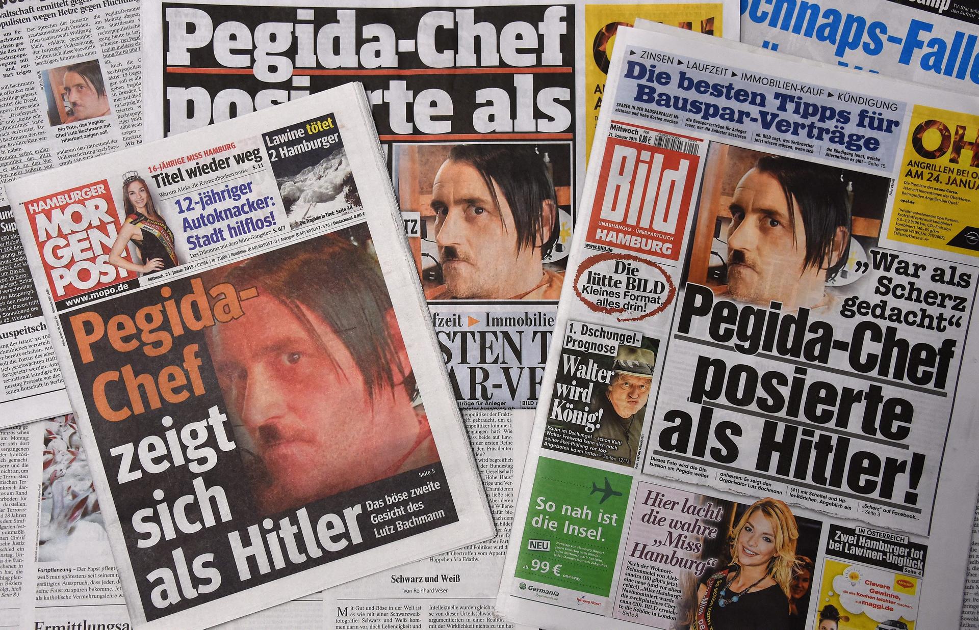 Newspapers show the picture of Lutz Bachmann posing as Adolf Hitler. Photo: EPA
