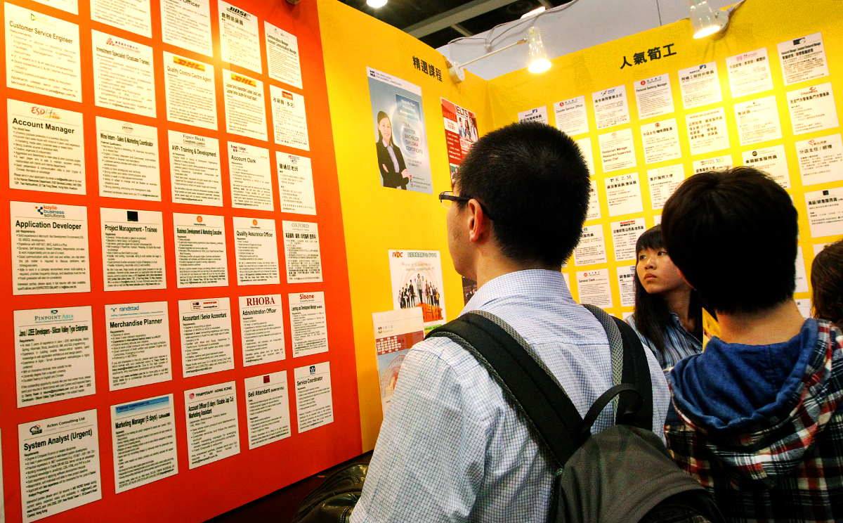 A job board festooned with positions at Hong Kong's Education and Careers Expo. The financial services sector's job growth is expected to hit 15 per cent. Photo:  May Tse