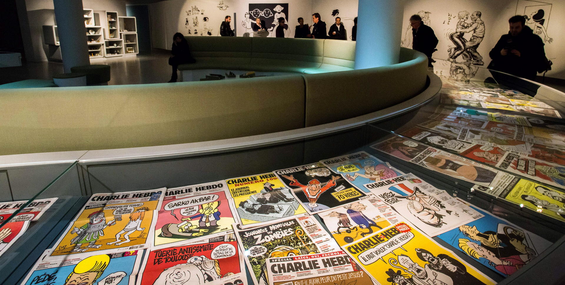 Issues of French satirical weekly Charlie Hebdo, 12 of whose artist were killed in a Paris attack, on display at the festival.Photo: AFP