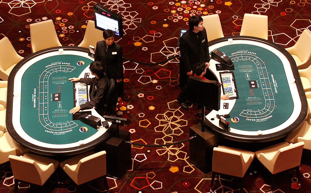 The Macau government will submit a bill to the legislative council proposing a full smoking ban in casinos, which may deal another blow to the gaming industry. Photo: Dickson Lee