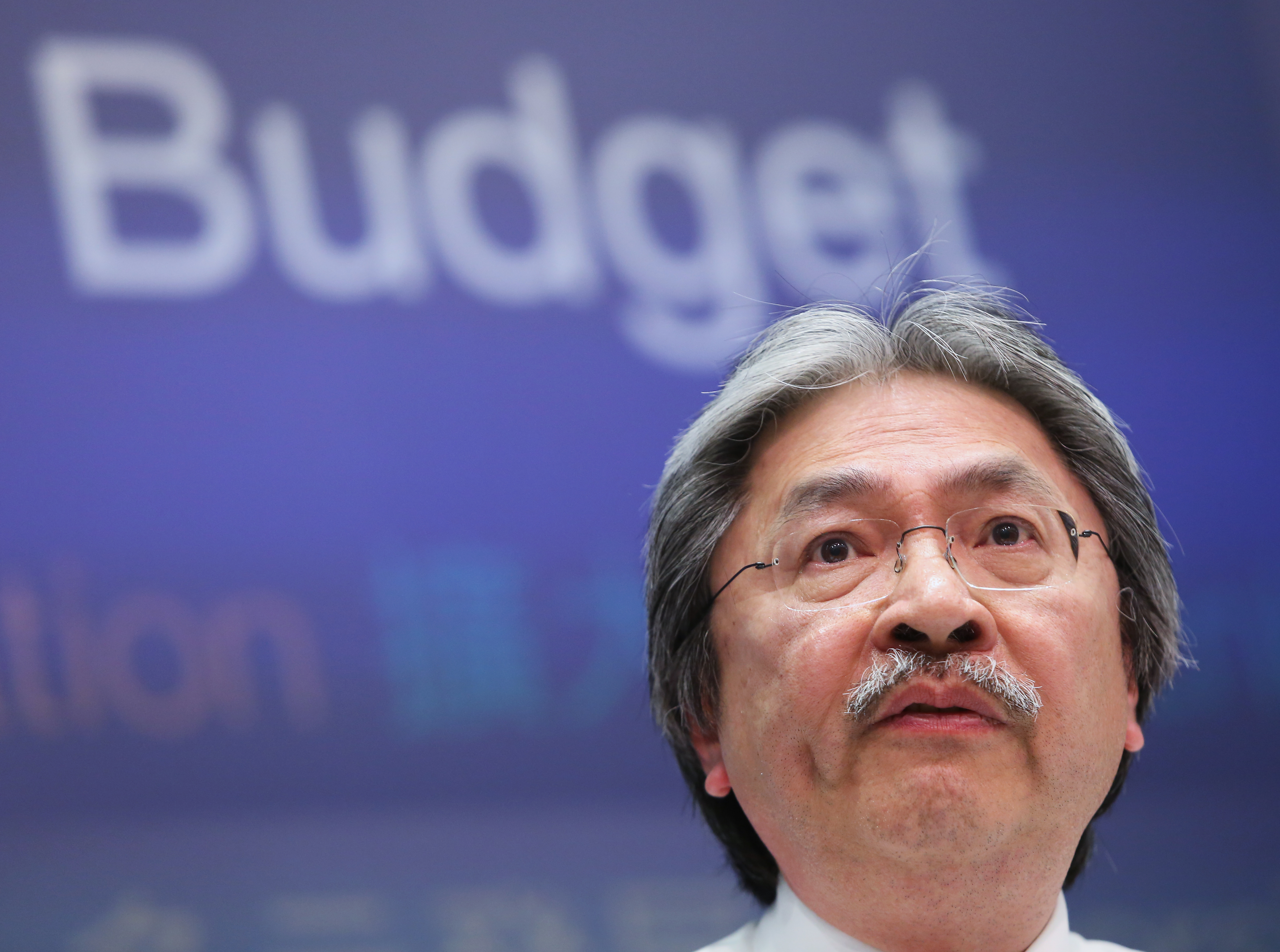 While John Tsang has outperformed his predecessors in enriching the government, few ordinary folk would share his sense of achievement. Photo: Sam Tsang