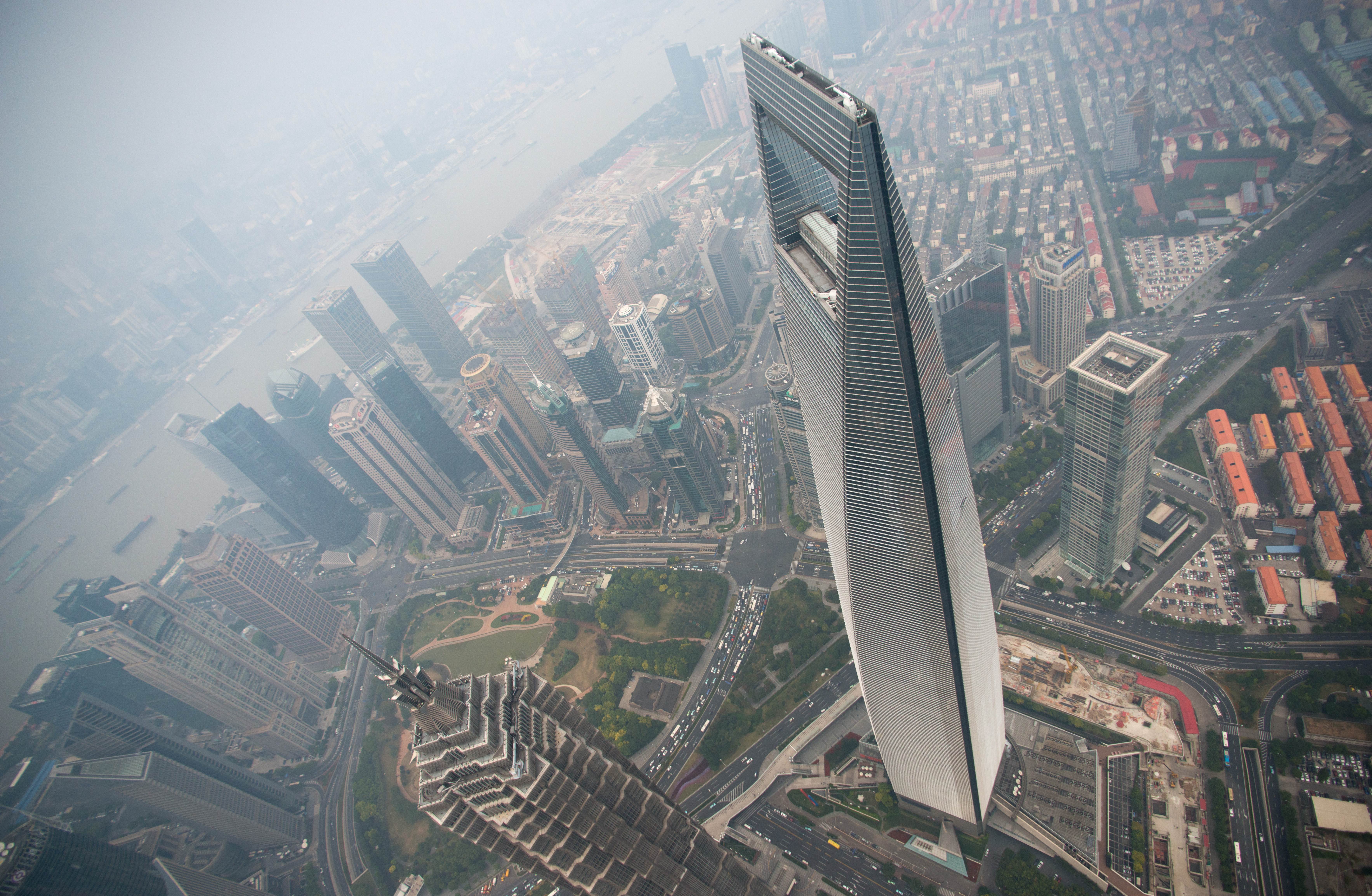 Высота небоскреба в метрах. Шанхайский Всемирный финансовый центр Шанхай. Шанхайский Всемирный финансовый центр (492 м). Шанхай, Китай. Шанхай ТОВЕР небоскреб. Небоскреб открывашка в Шанхае.