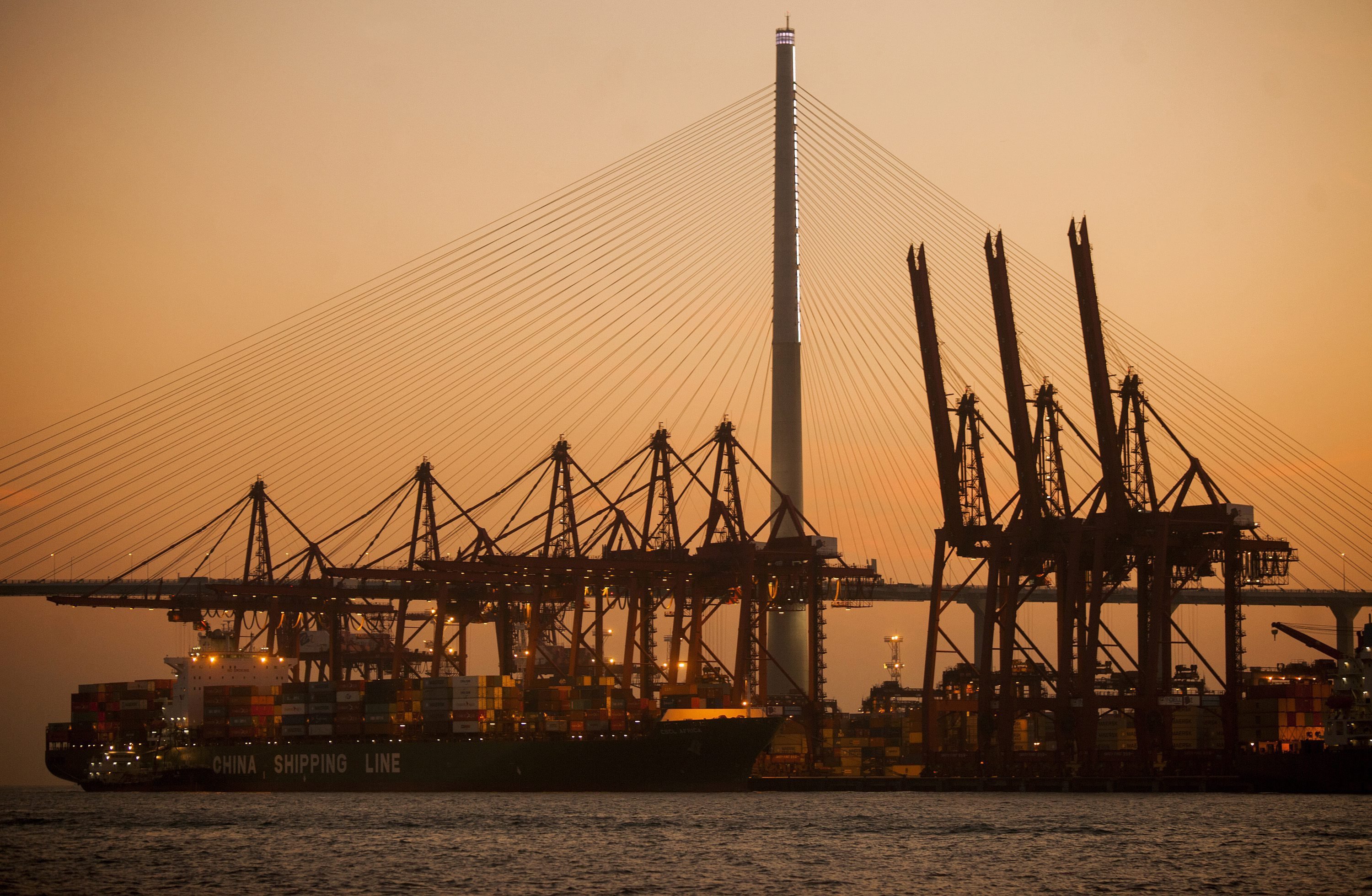 Ships berthed at the Kwai Chung port. Here in Hong Kong, the shipping industry voluntarily initiated the Fair Winds Charter in 2011. Photo: EPA