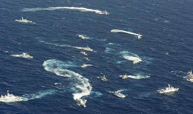 Fishing boats from Taiwan near the disputed islands are shadowed by ships from the Taiwanese and Japanese coastguards. Photo: Reuters