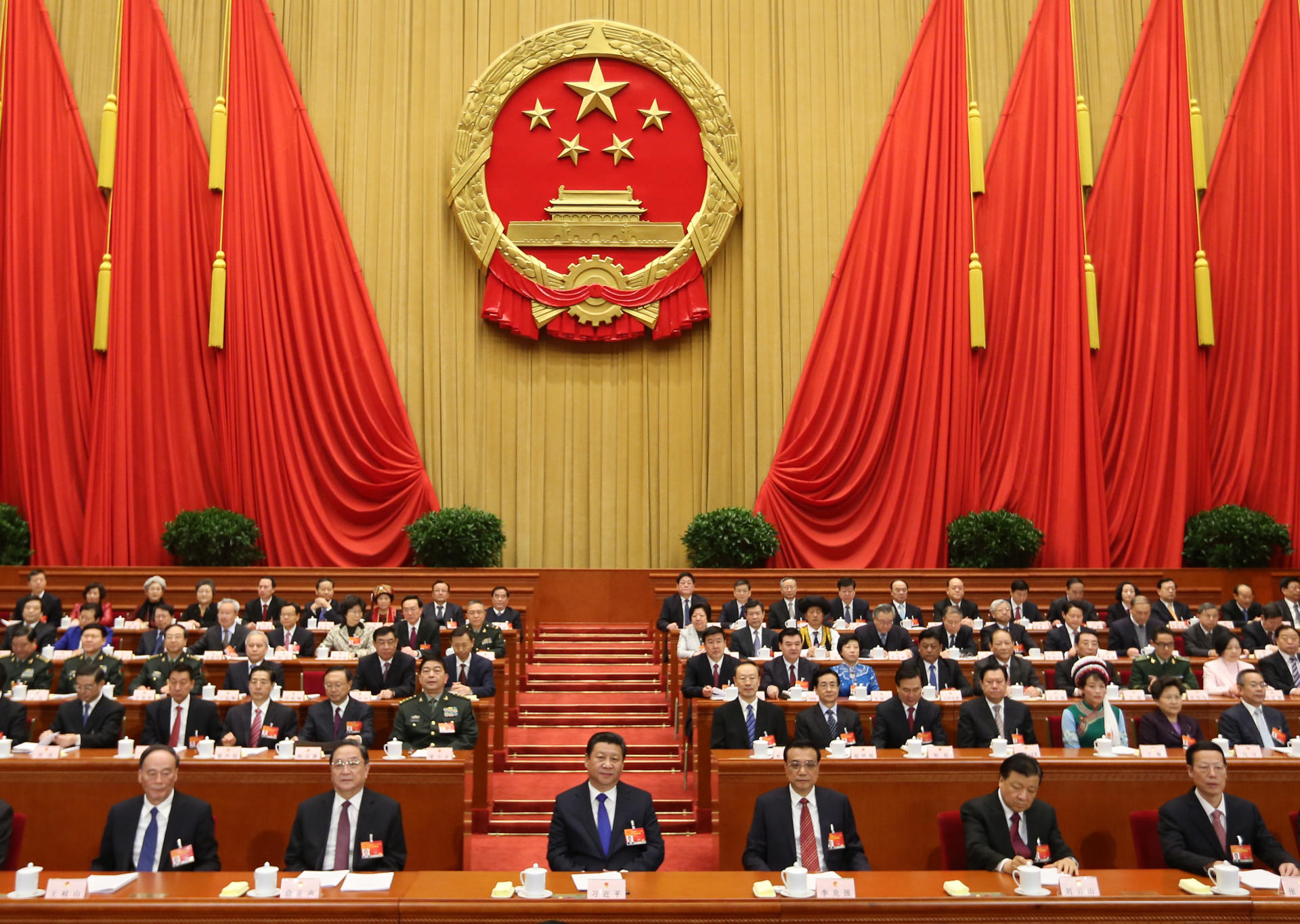 President Xi Jinping (centre) and Premier Li Keqiang (to his left) at the opening of the NPC. Photo: Xinhua