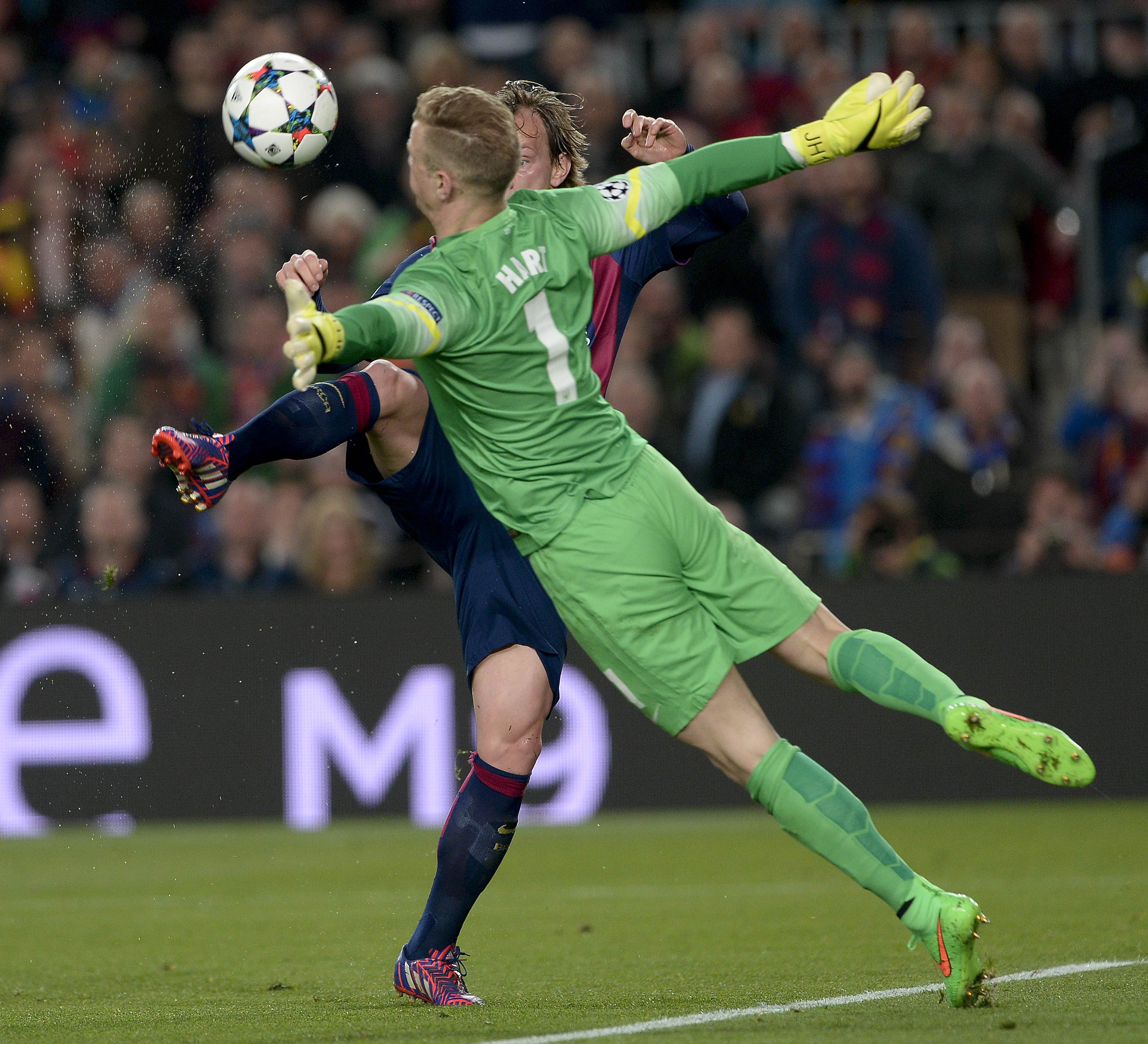 Barcelona's Ivan Rakitic scores past Manchester City keeper Joe Hart. Photo: AFP