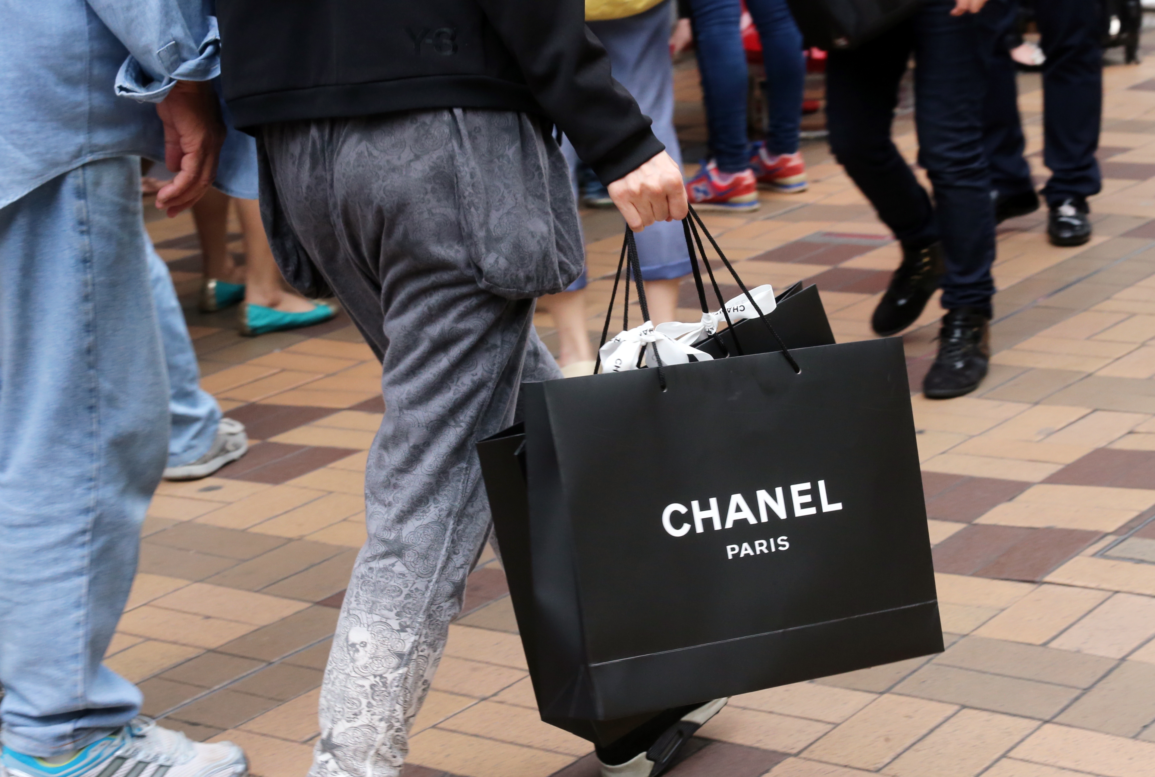Chinese Luxury Market: Chanel Tops in Handbags and Fashion Apparel – WWD