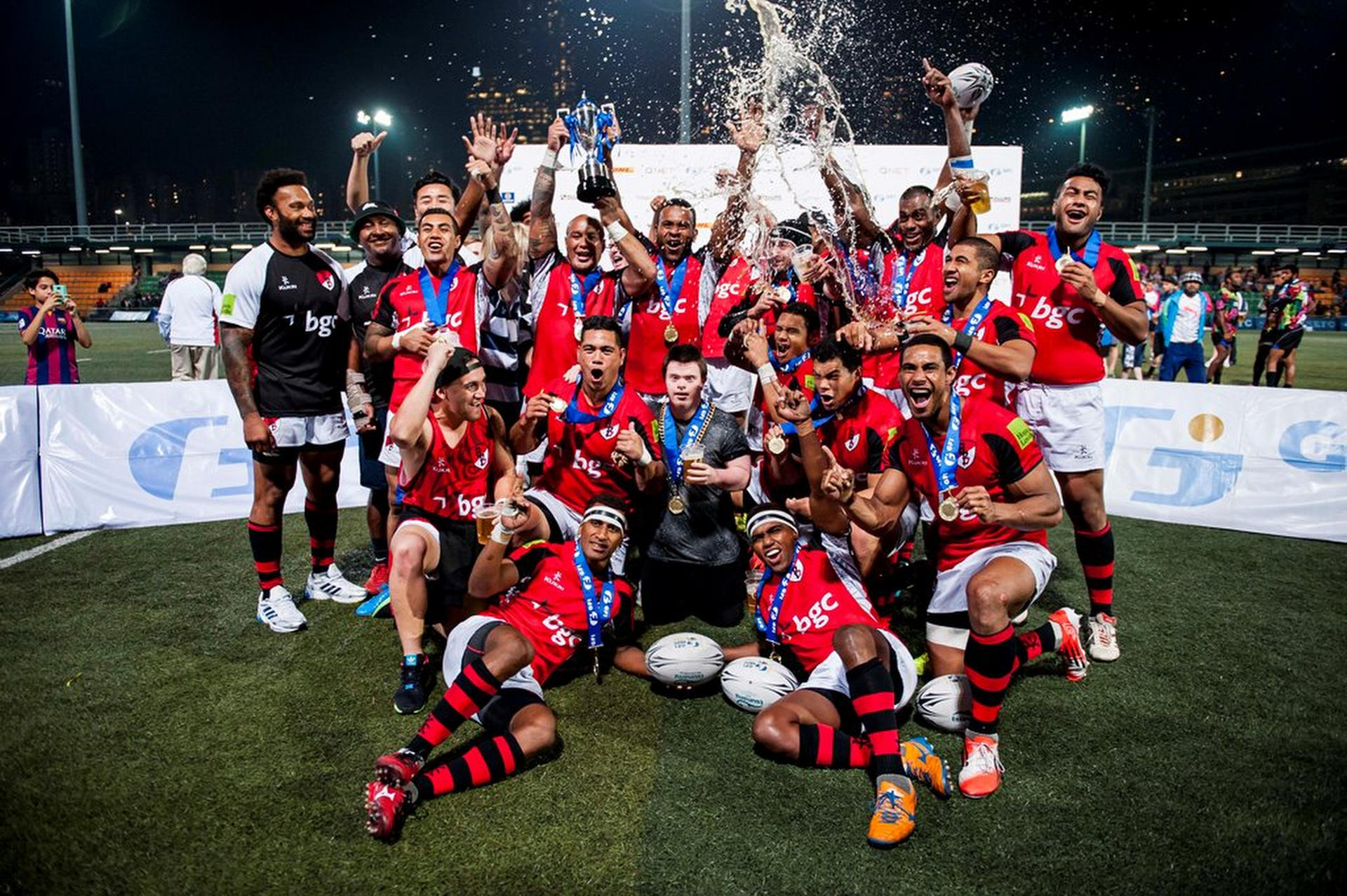 The BGC Asia-Pacific Dragons celebrate their victory in the Cup final at the GFI HKFC Tens on Thursday night. Photos: SCMP Pictures