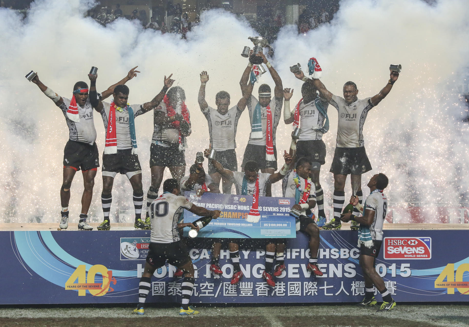 The bubbly flows as the outstanding Fiji squad celebrate their victory over New Zealand in the Cup final at the Hong Kong Sevens. Photo: Sam Tsang/SCMP