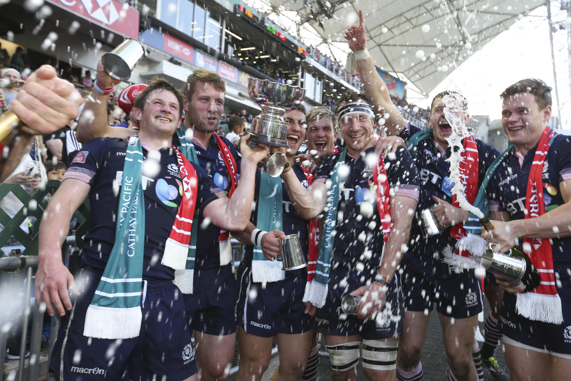 Proud Scotland players celebrate after defeating France 26-5 in the Bowl final to take some silverware back home. Photos: Sam Tsang/SCMP