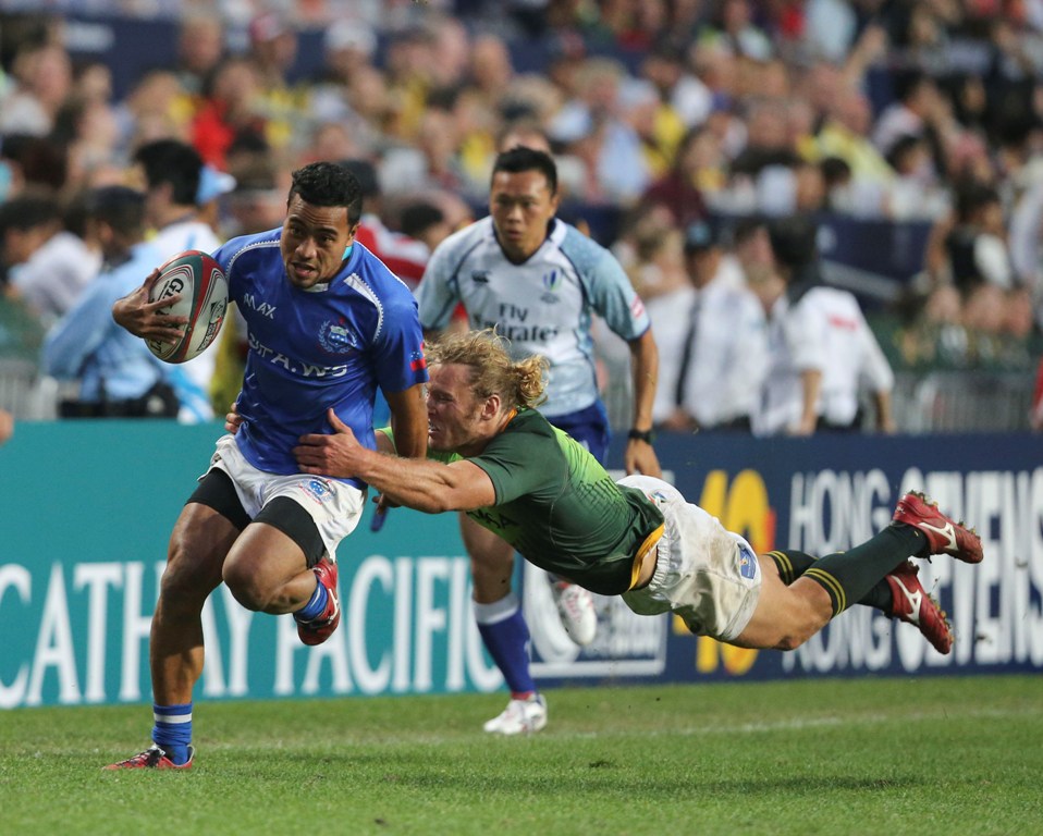 Samoa’s Samoa Toloa slips a committed Werner Kok tackle during Sunday’s Hong Kong Sevens third-place play-off match won by South Africa. Photos: KY Cheng/SCMP