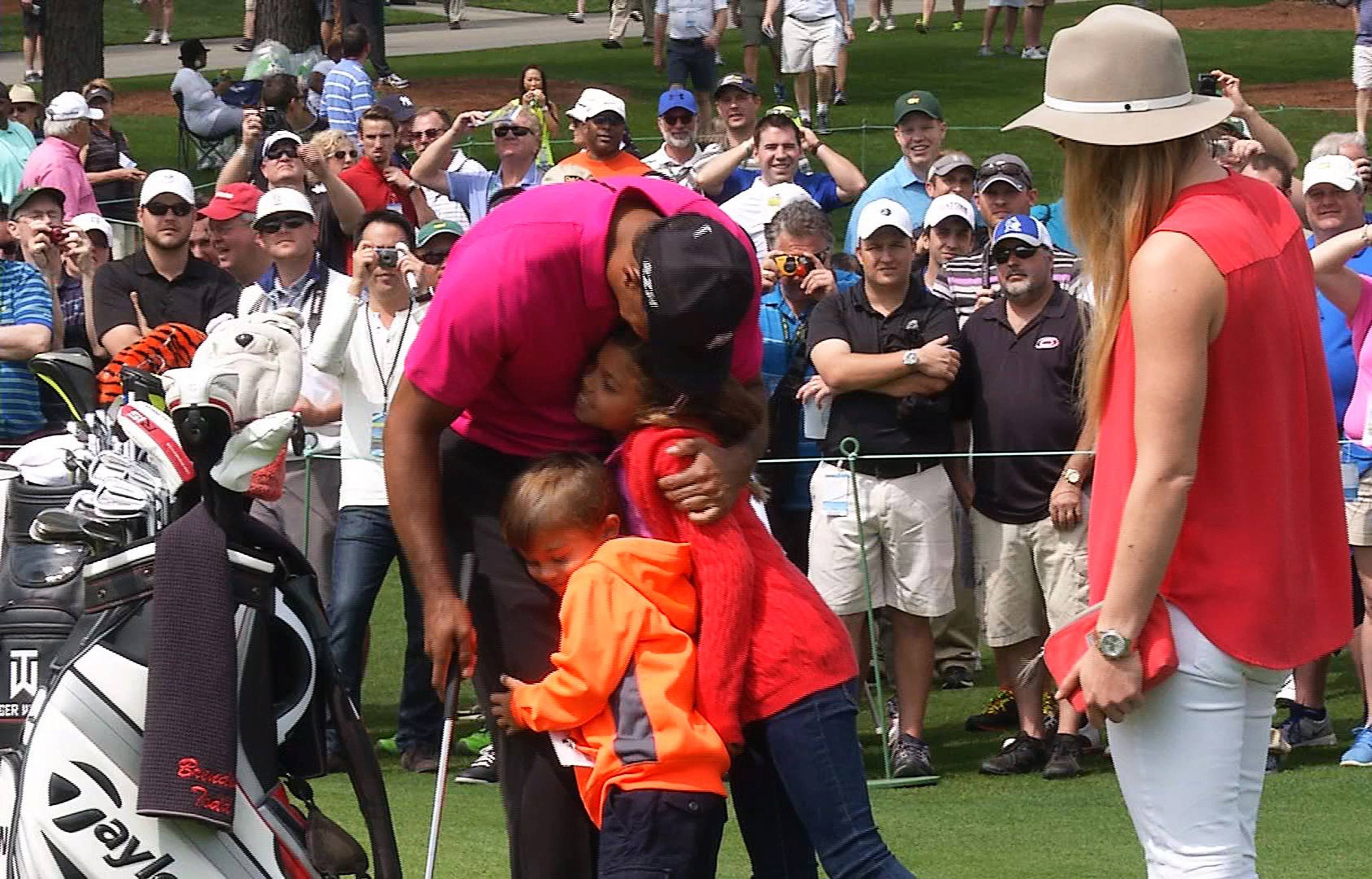 Tiger Woods with his kids and girlfriend at Augusta. Photo: Reuters