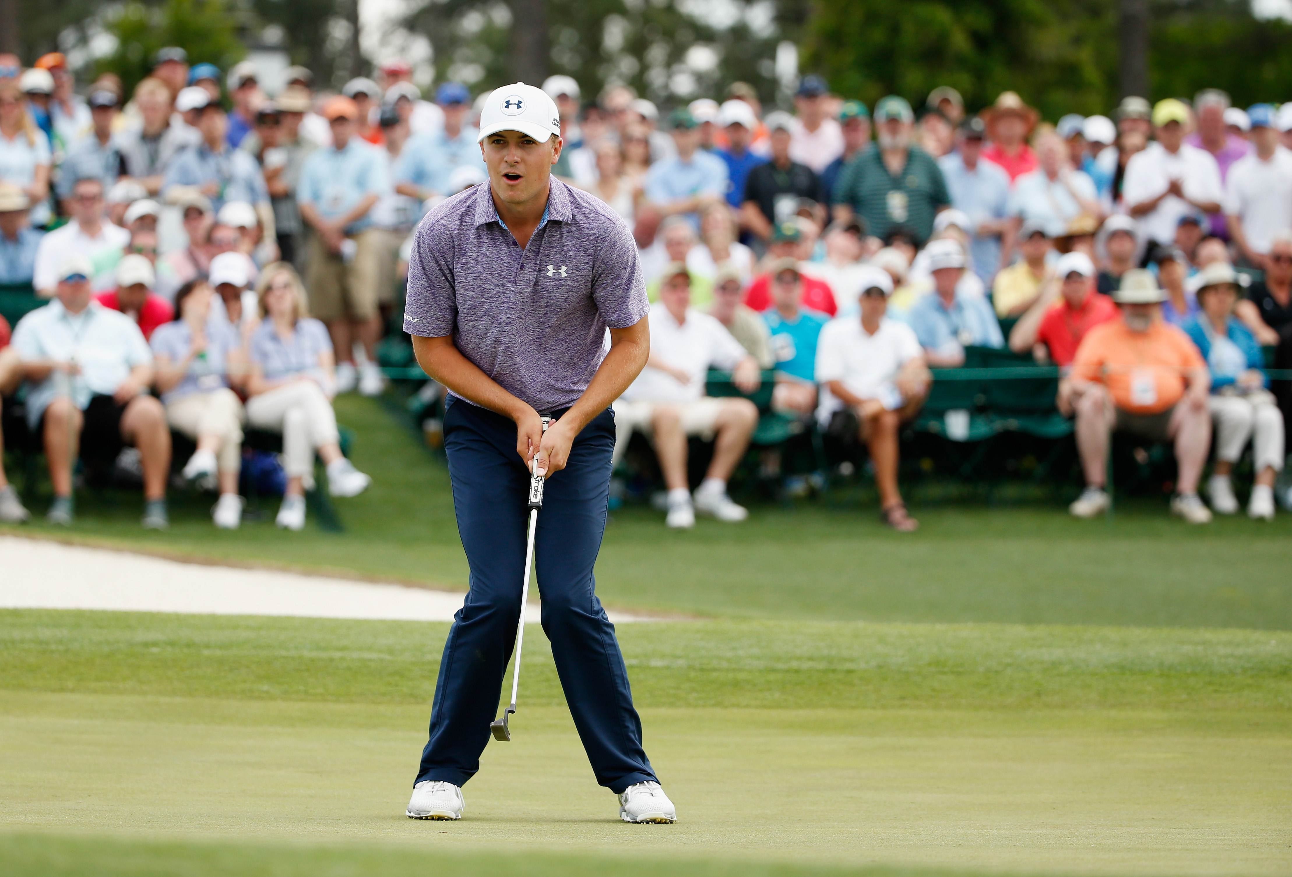 Jordan Spieth just misses a birdie putt on the 18th green during his second-round 66 at the Masters at Augusta National Golf Club. Photo: AFP