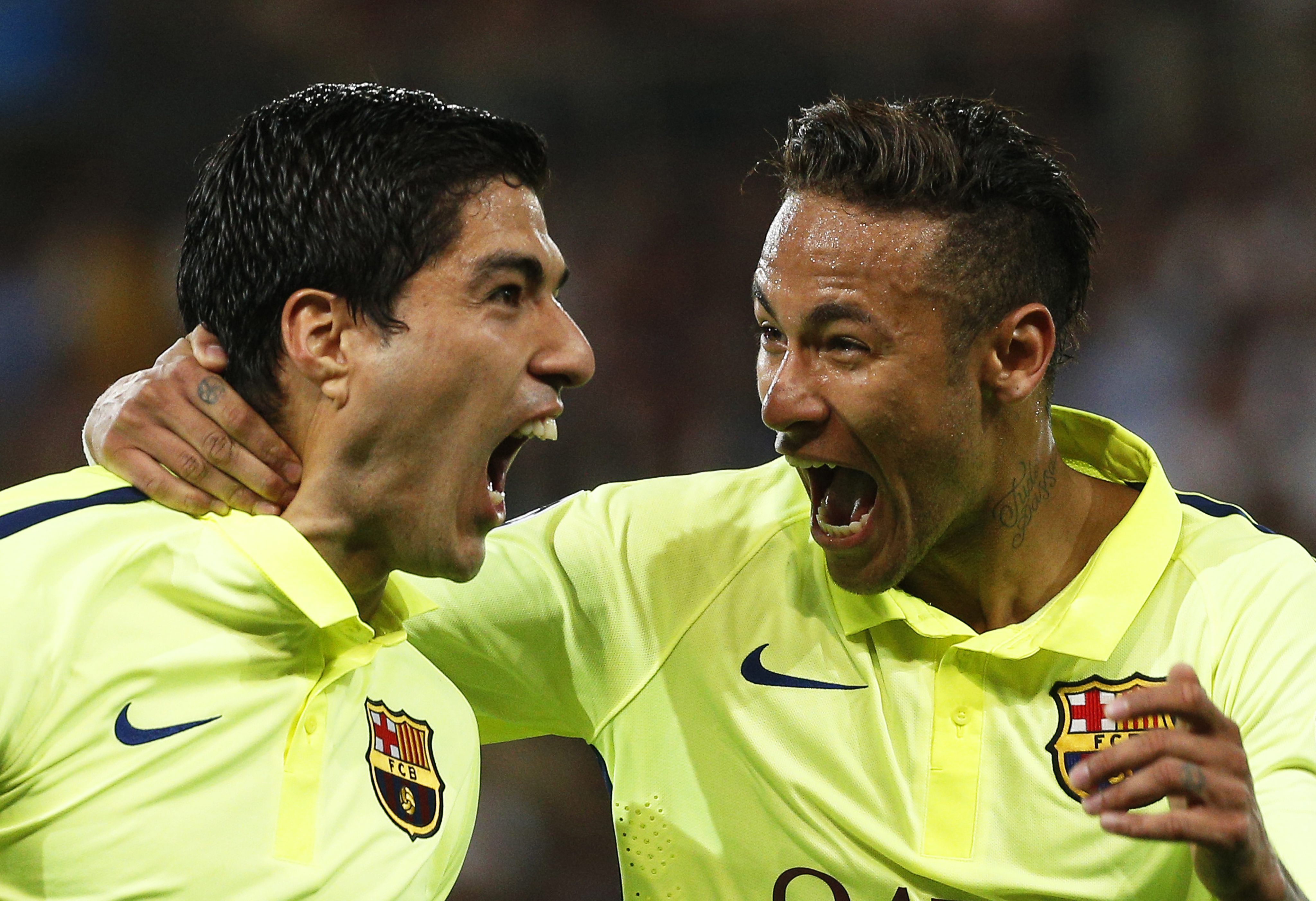 Luis Suarez and Neymar celebrate. Photo: EPA