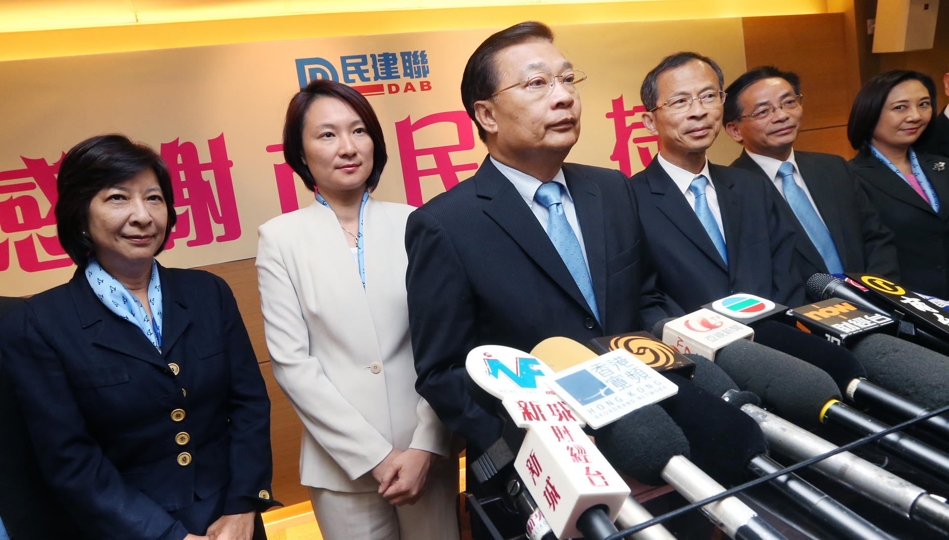 Starry Lee at Tam Yiu-chung's shoulder after the party emerged the biggest winner in the 2012 Legco elections. Photo: David Wong