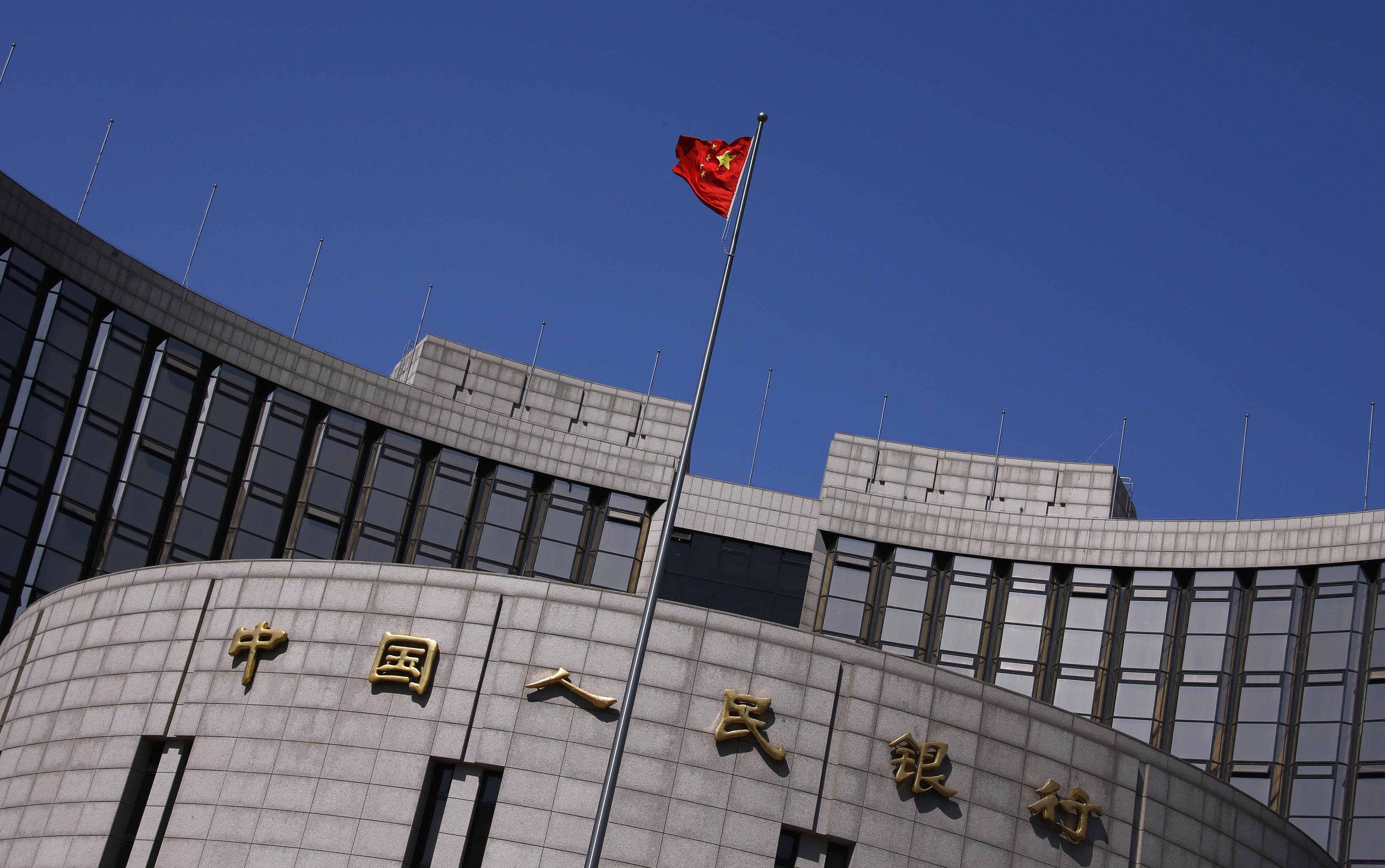 Data from the People's Bank of China shows the country's social financing reached 123 trillion yuan at the end of last year. Photo: Reuters 