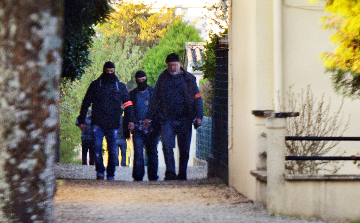 French policemen search the Vert-Bois neighbourhood in Saint-Dizier  where a Franco-Algerian student, allegedly planning a church attack in France, used to spend time with his family. Photo: AFP