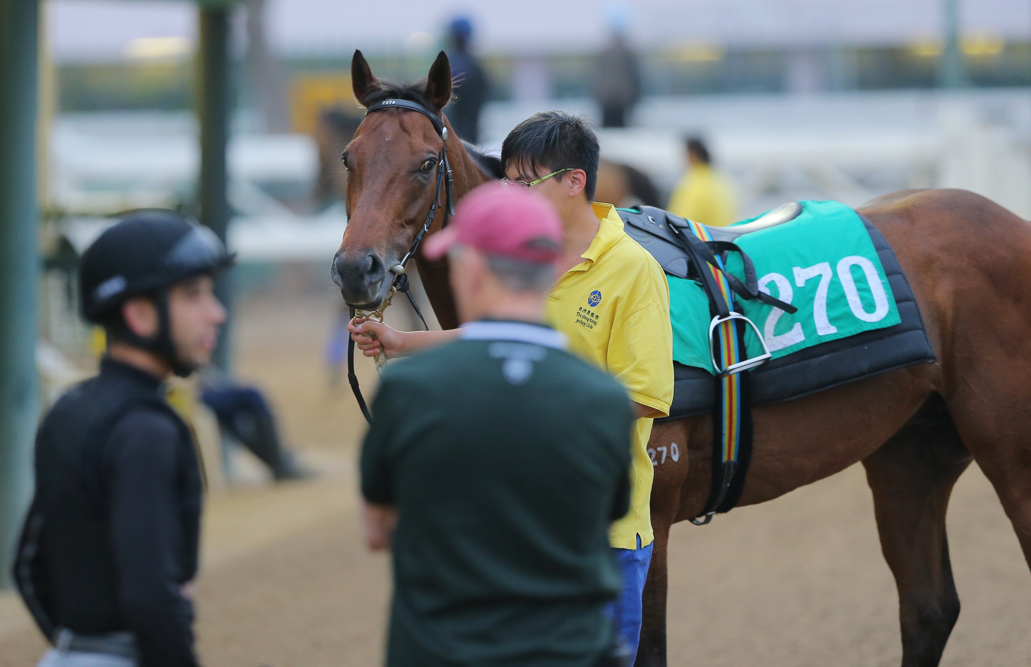 Jockey Joao Moreira and trainer John Moore discuss the gallop of Designs On Rome after trackwork at Sha Tin on Thursday. Photos: Kenneth Chan