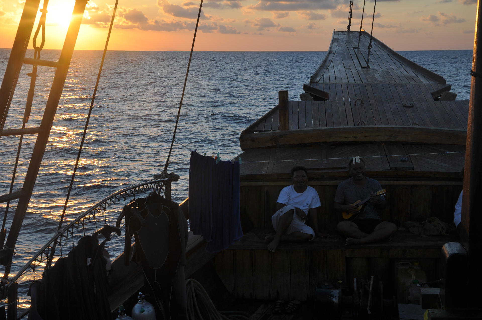 Sunset on a live-aboard dive boat. Our vessel, The Damai, is styled after the phinisi, a traditional Indonesian two-masted sailing ship. Photos: Holly McDonald