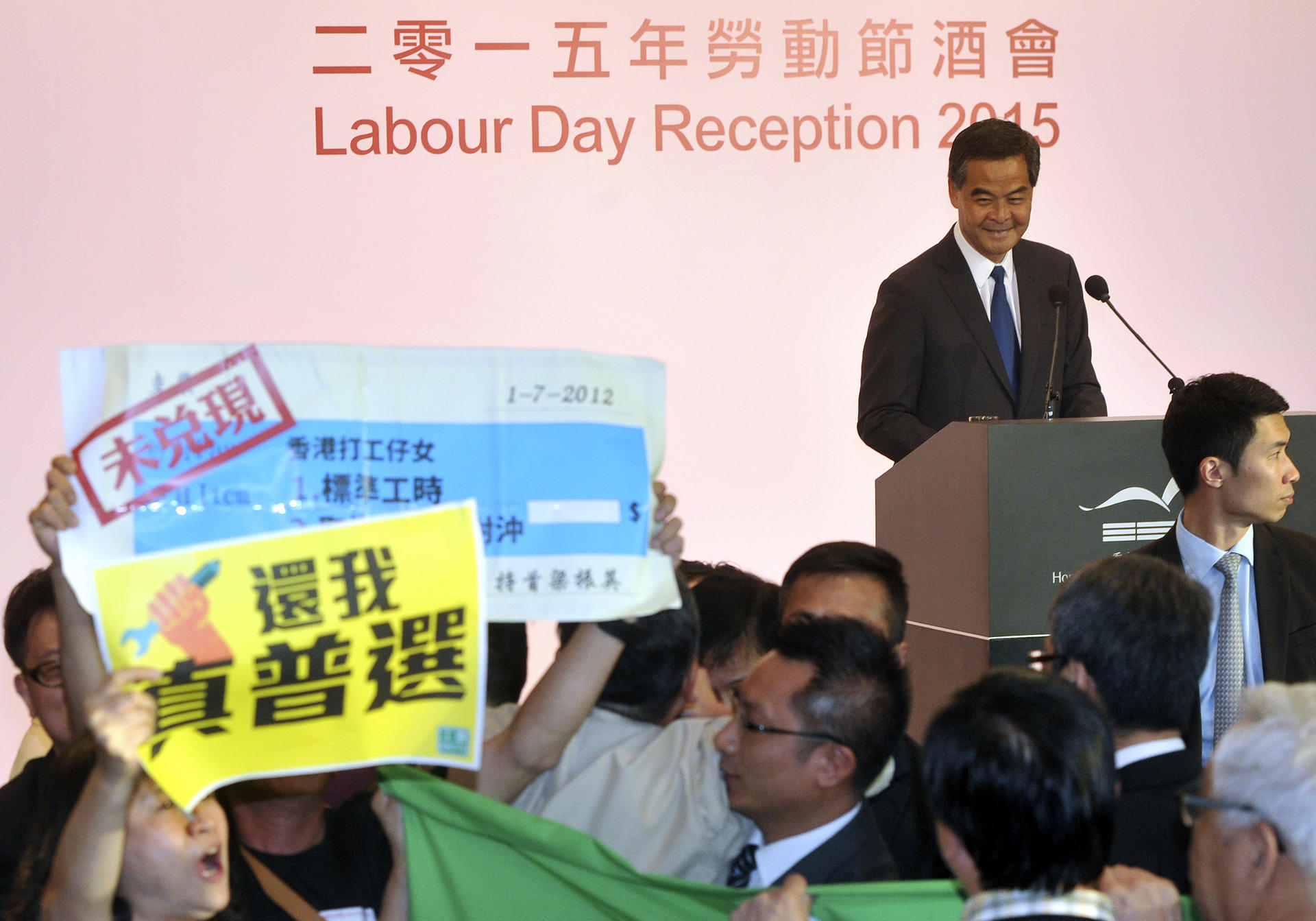 Leung appears to smile during the fracas.Photo: SCMP Pictures