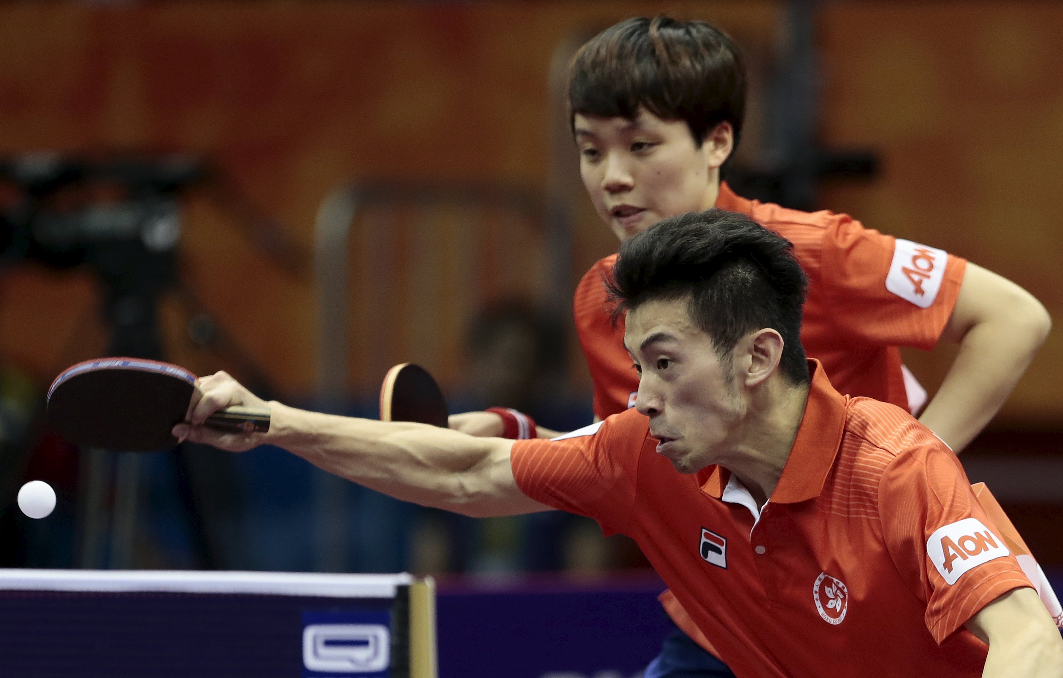 Hong Kong's Wong Chun-ting (front) and Doo Hoi-kem secured a bronze medal in the mixed doubles. Photo: Reuters