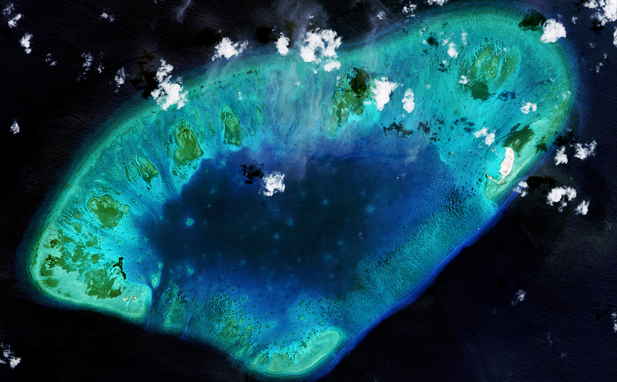 This 2015 satellite image shows an expansion of land area in the Vietnamese-controlled West London Reef region of the Spratly archipelago in the South China Sea. Photo: Reuters  