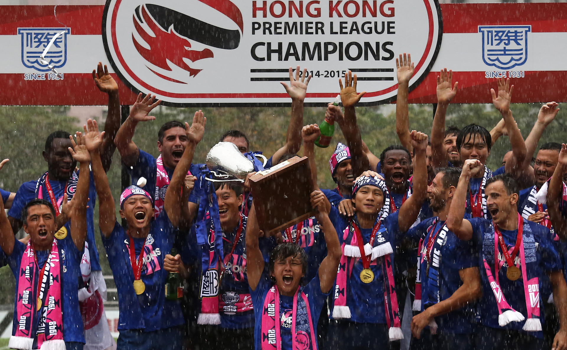 Kitchee players celebrate clinching the Hong Kong Premier League title. Photos: Jonathan Wong