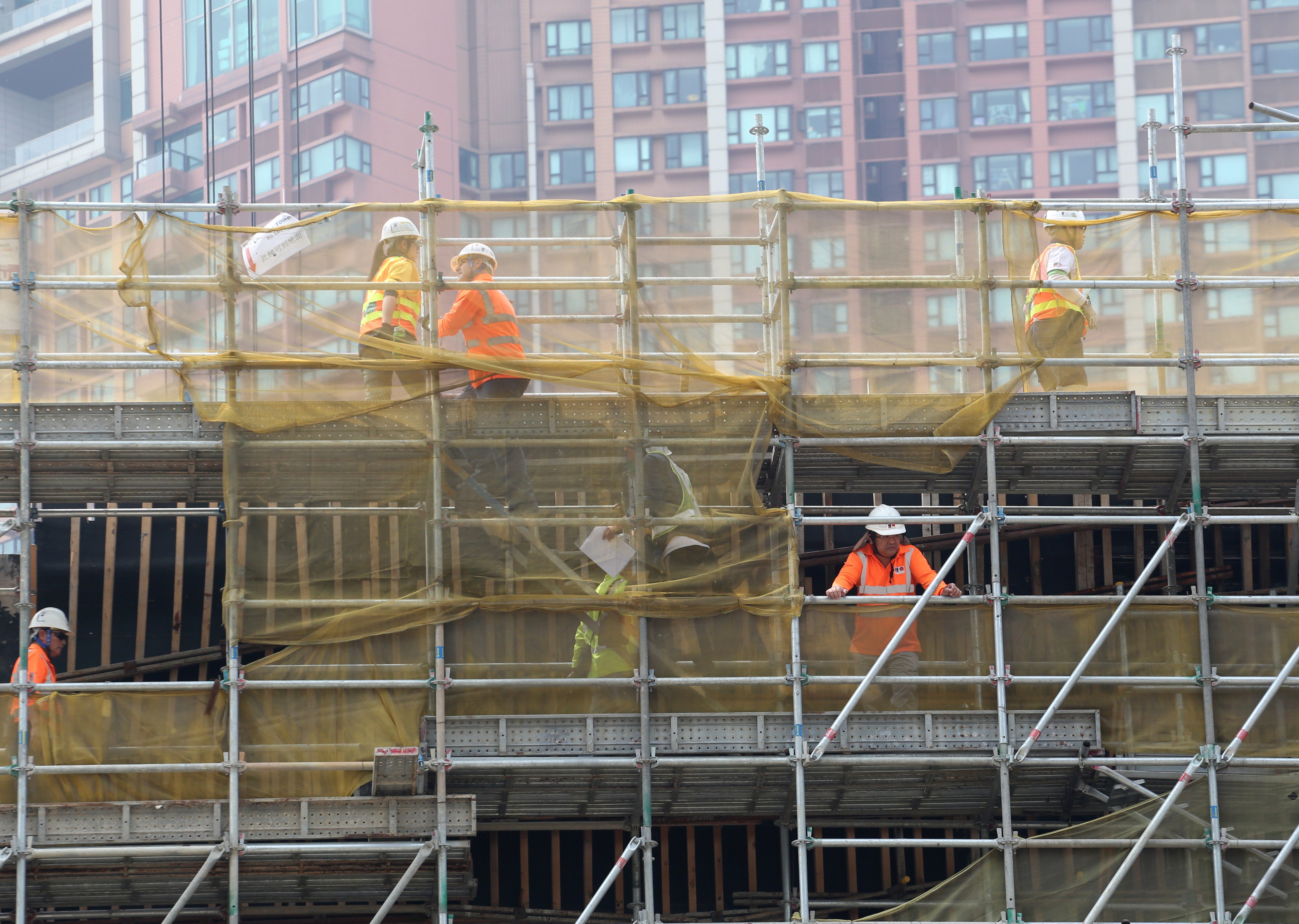 Work proceeds at the West Kowloon terminus of the high-speed rail link. The project may now cost up to HK$90 billion. Photo: Felix Wong