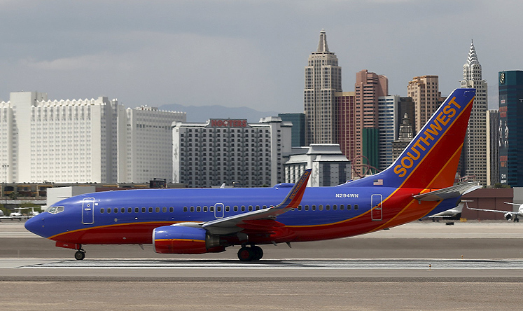 A Southwest Airlines passenger jet is seen with the Las Vegas strip in the background. Photo: Reuters