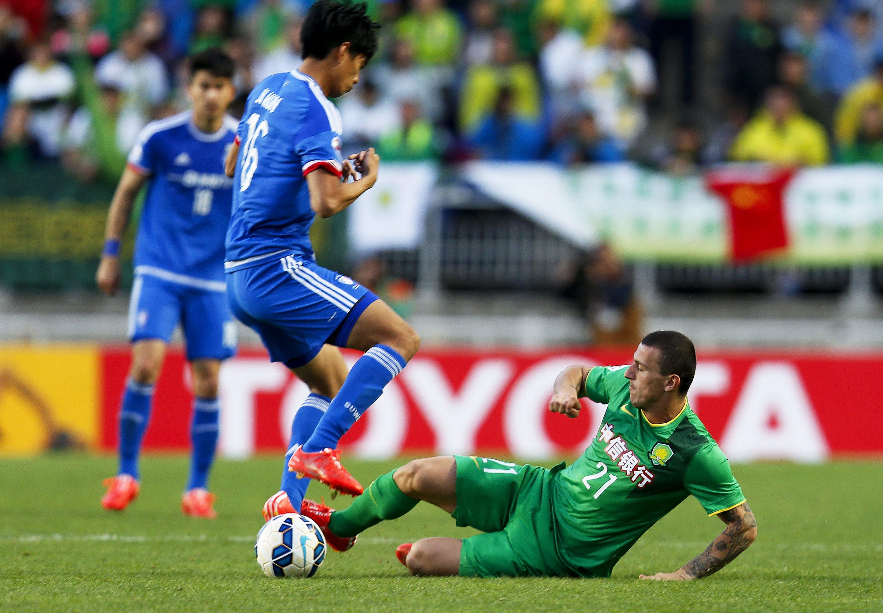 Beijing Guoan have faced some tough games on route to the last 16 of this year's AFC Champions League. Photo: EPA