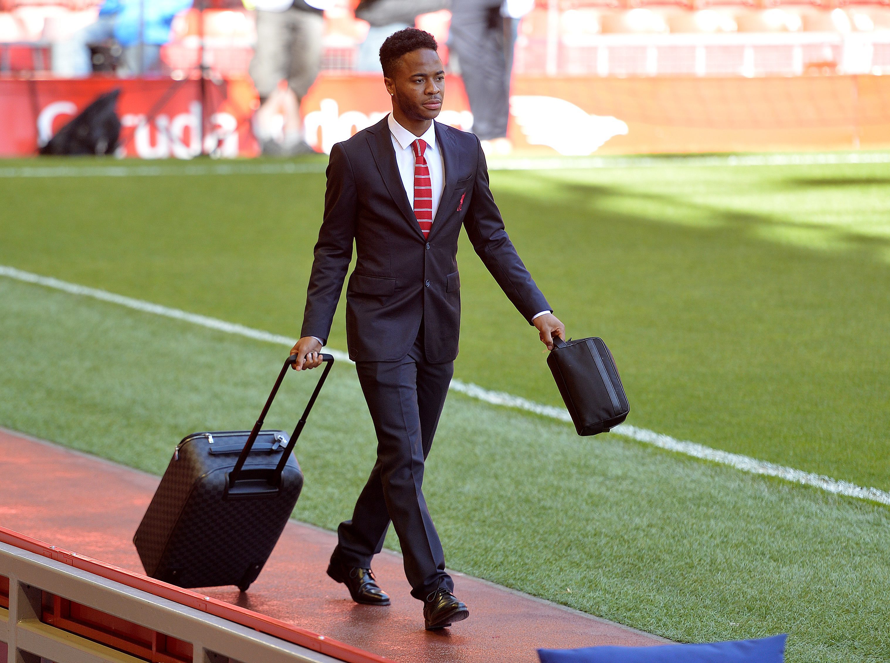 My bags are packed I'm ready to go ... Raheem Sterling could be on his way. Photo: EPA