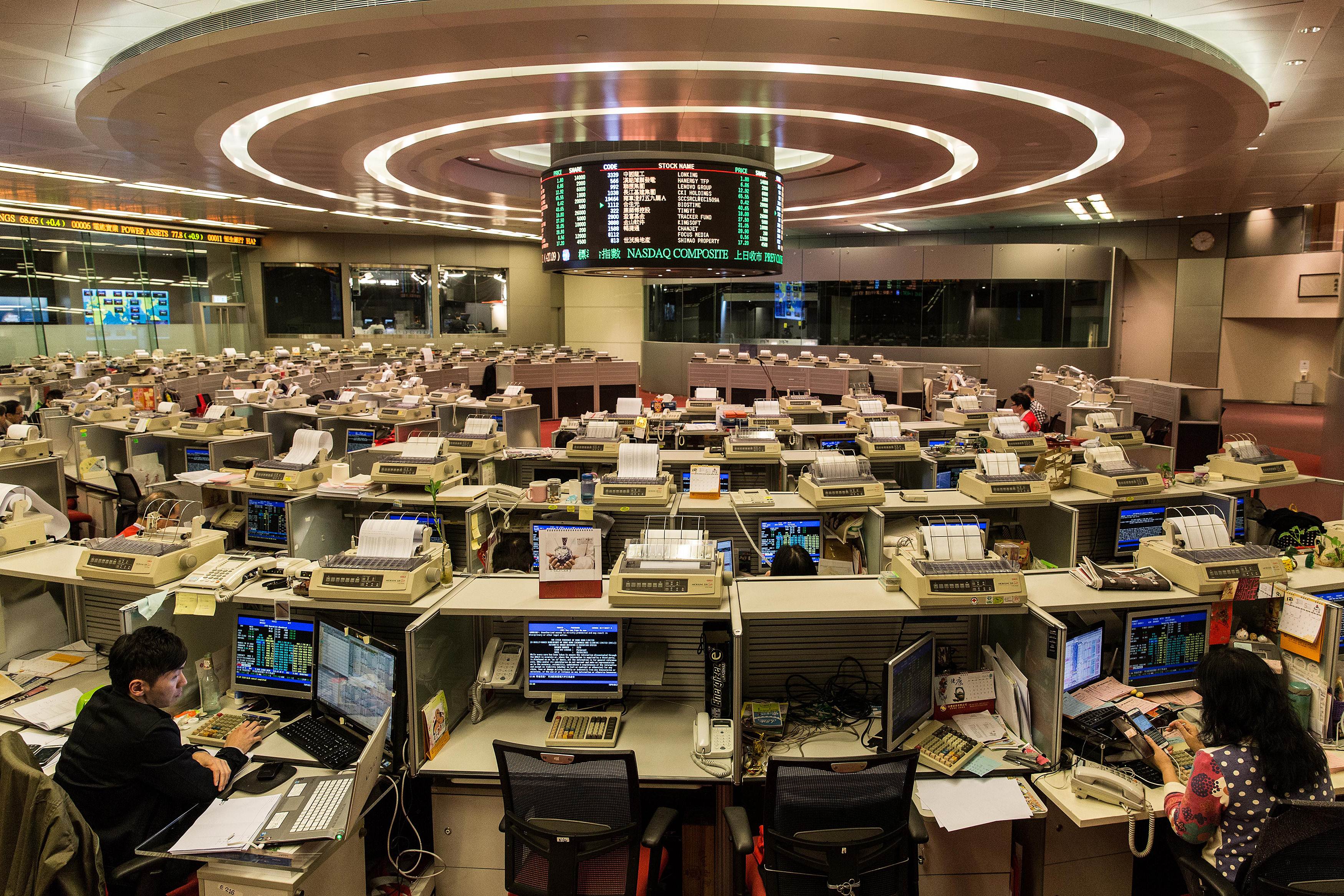The trading floor of the Hong Kong stock exchange where shares of Hanergy were suspended after dropping 47 per cent on Wednesday. Photo: AFP