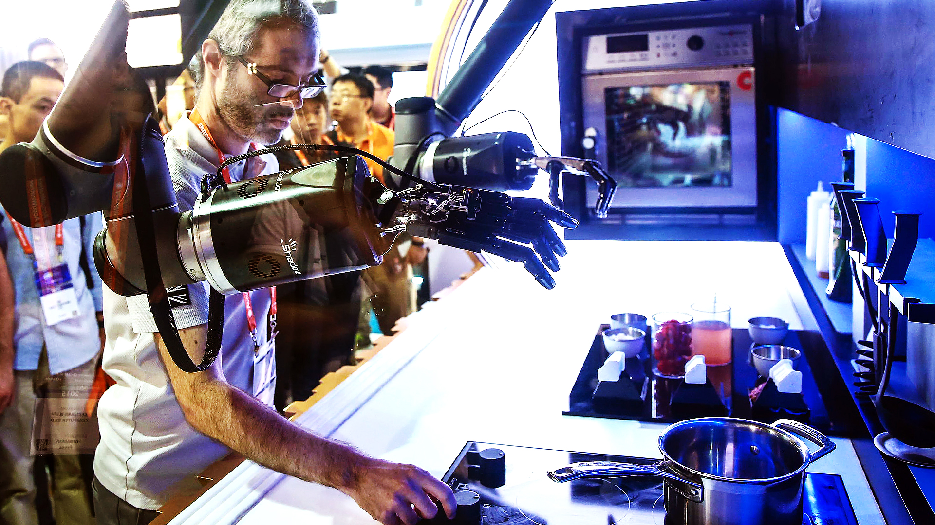 Moley Robotics' automated kitchen cooks for attendees at CES Asia in Shanghai. Photo: AFP