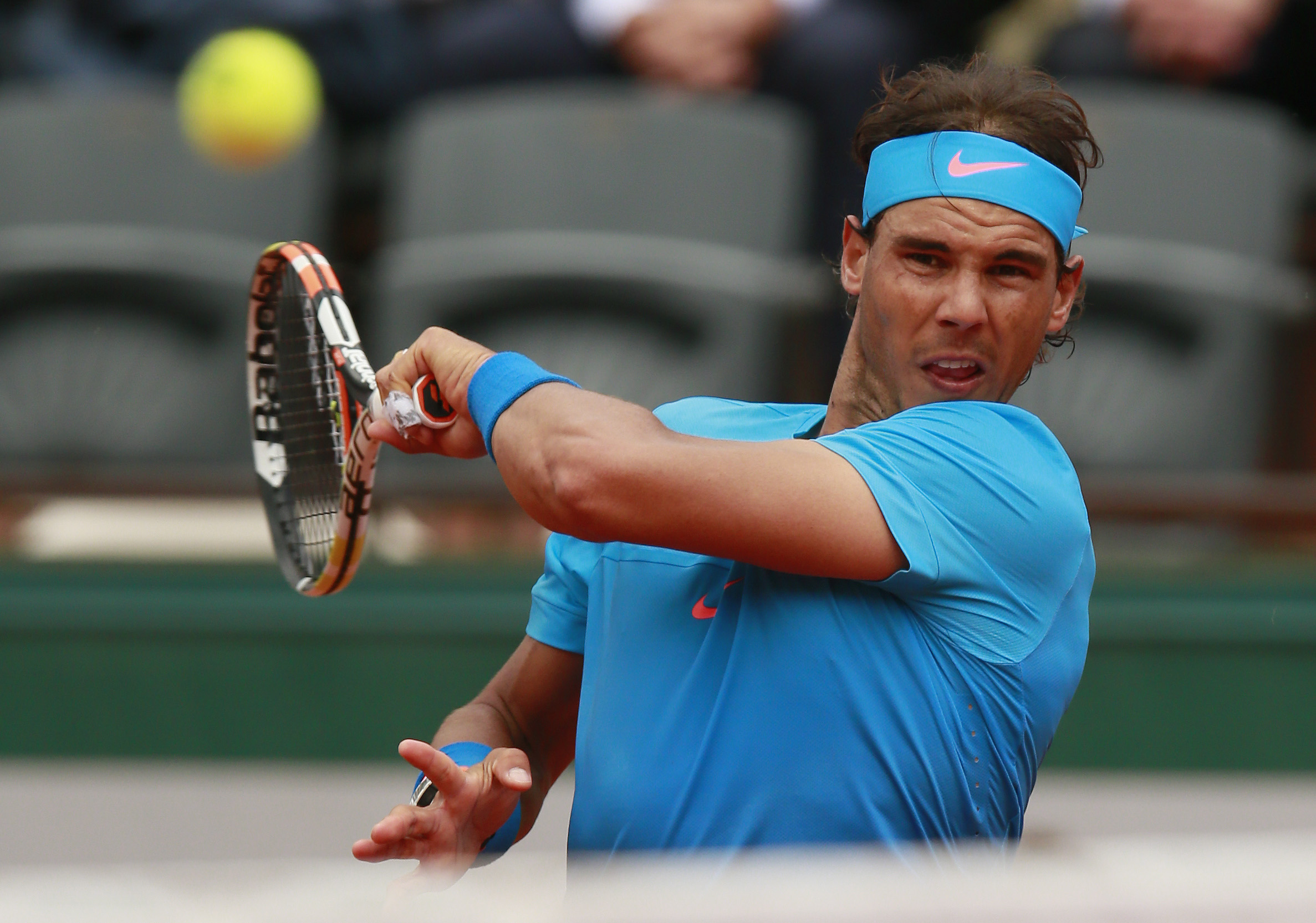 Rafael Nadal returns to young Frenchman Quentin Halys. Photo: Reuters