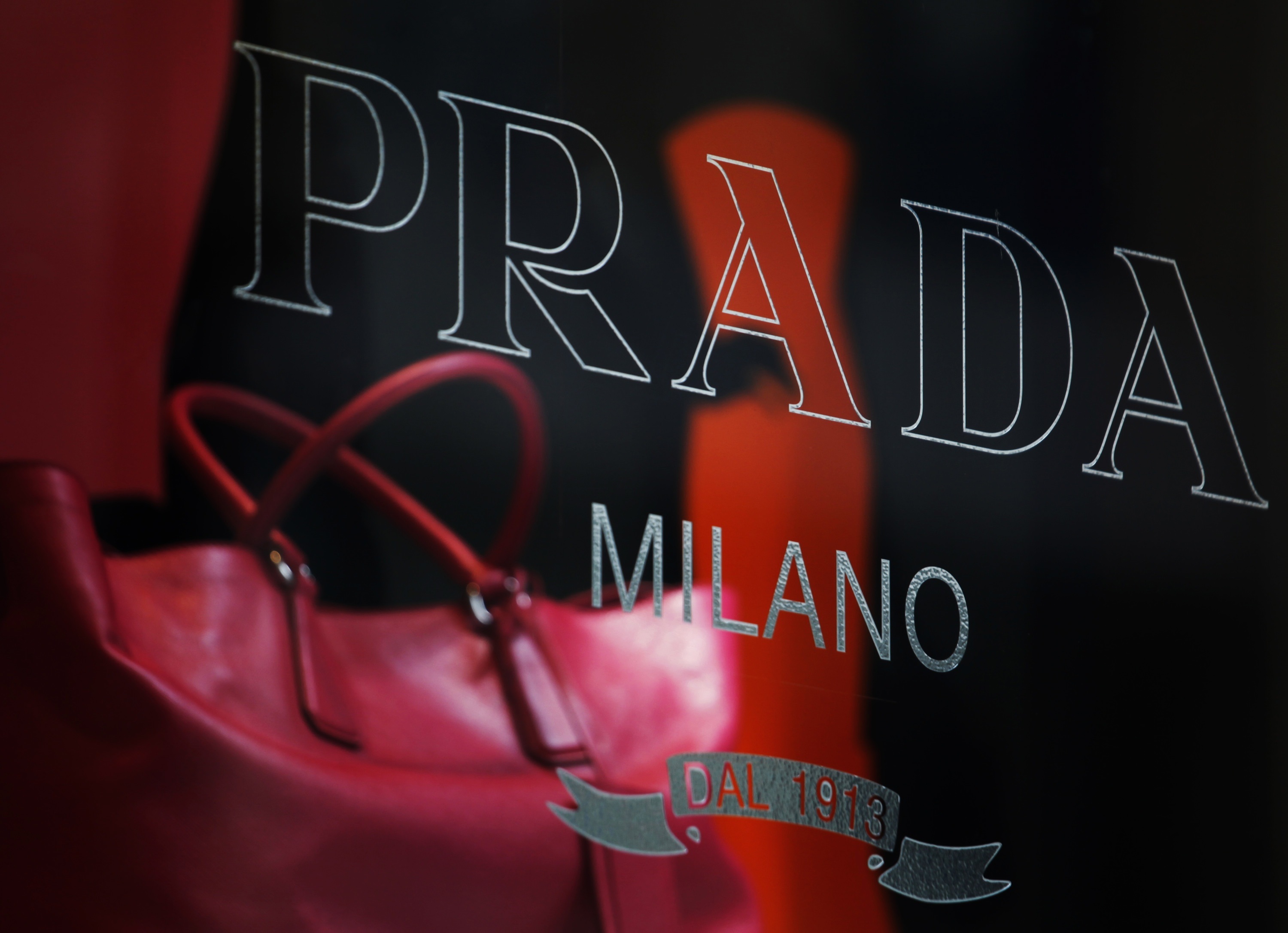 One of the man's buyers was caught returning from South Korea with five Prada bags worth tens of thousands of yuan. Photo: Reuters
