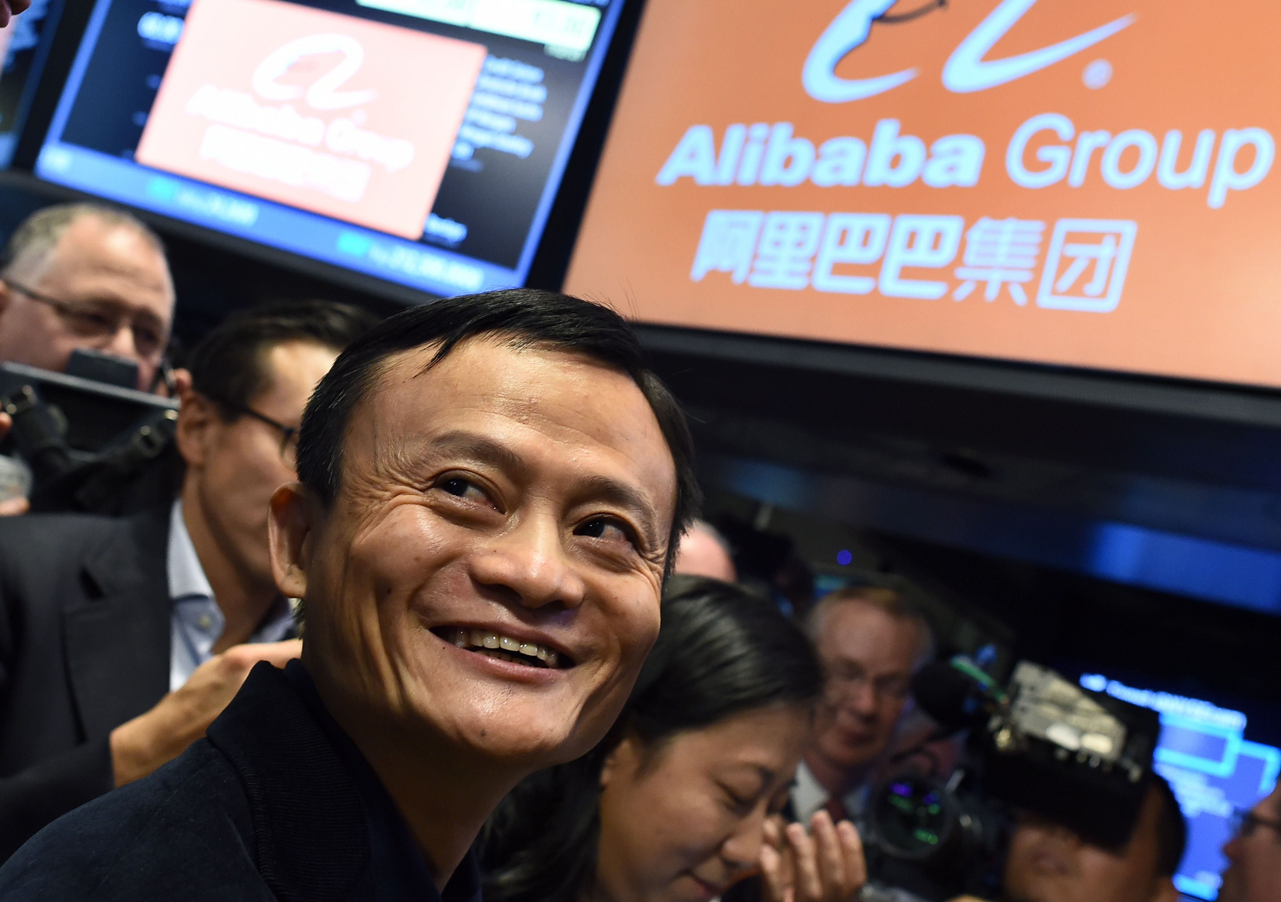 Alibaba's Jack Ma at the debut of his company in New York. News that he and other investors have piled into Reorient Group sparked a huge rally in its shares in Hong Kong on Monday. Photo: AFP