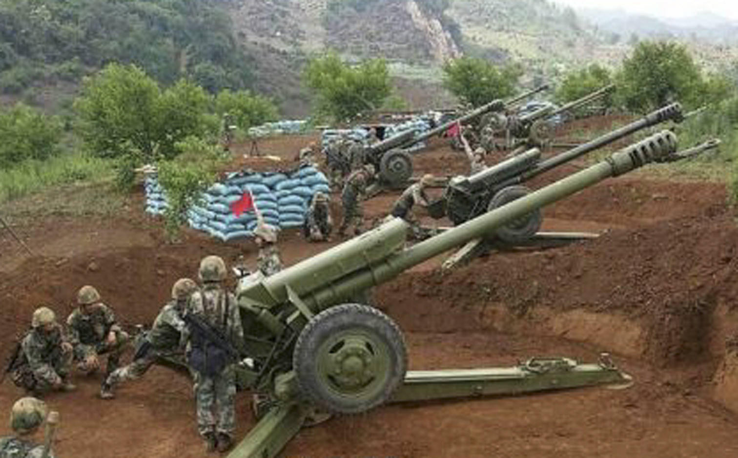 Regular and reserve troops from the army and air force take part in the live-fire drill near the border. Photo: SCMP Pictures