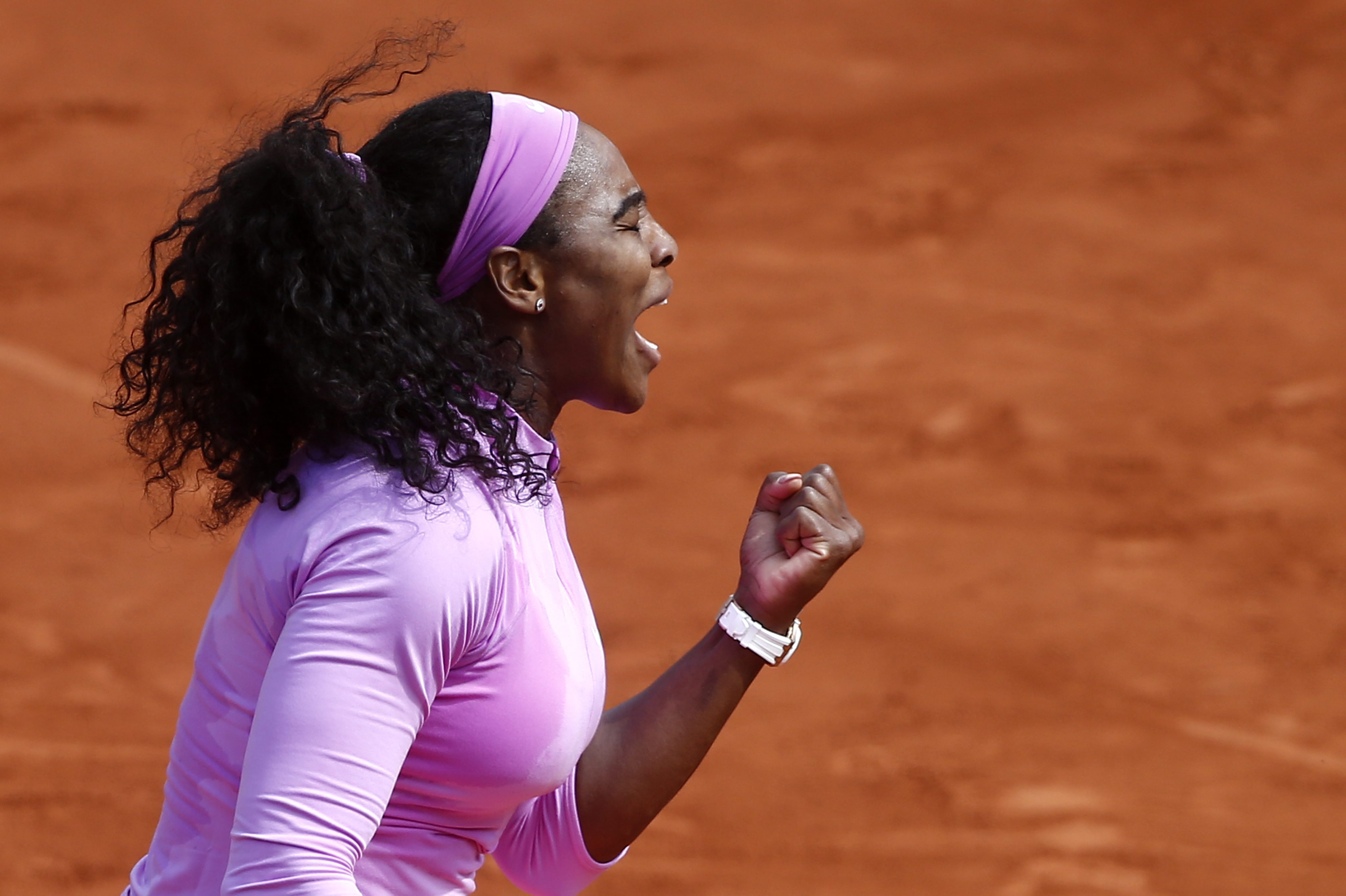 Serena Williams pumps herself up during her fourth round match against Sloane Stephens at Roland Garros. Photo: EPA