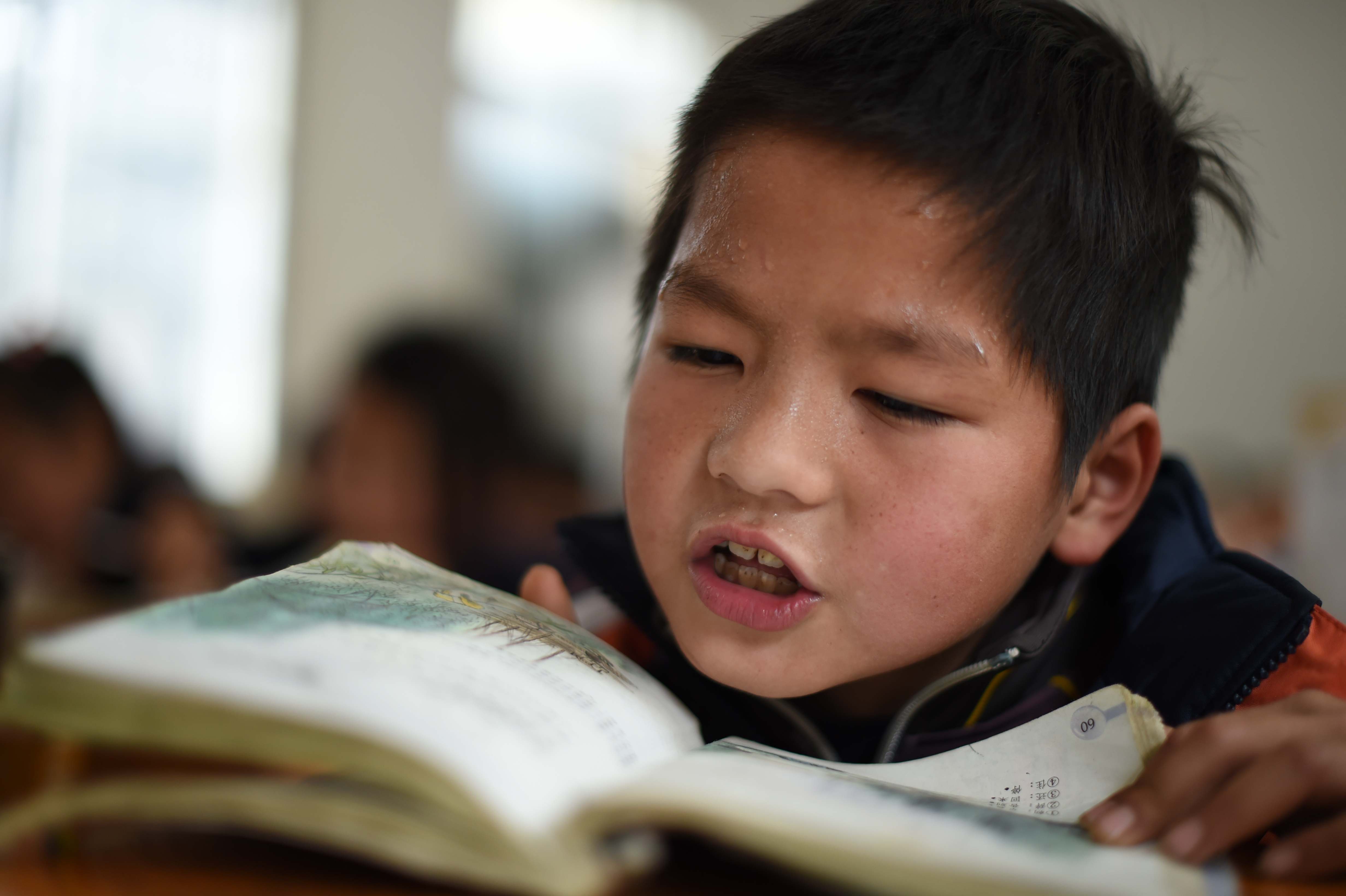 Schools in the rural areas and poorer provinces lack the resources to provide the same quality of education as the best schools. Photo: Xinhua 