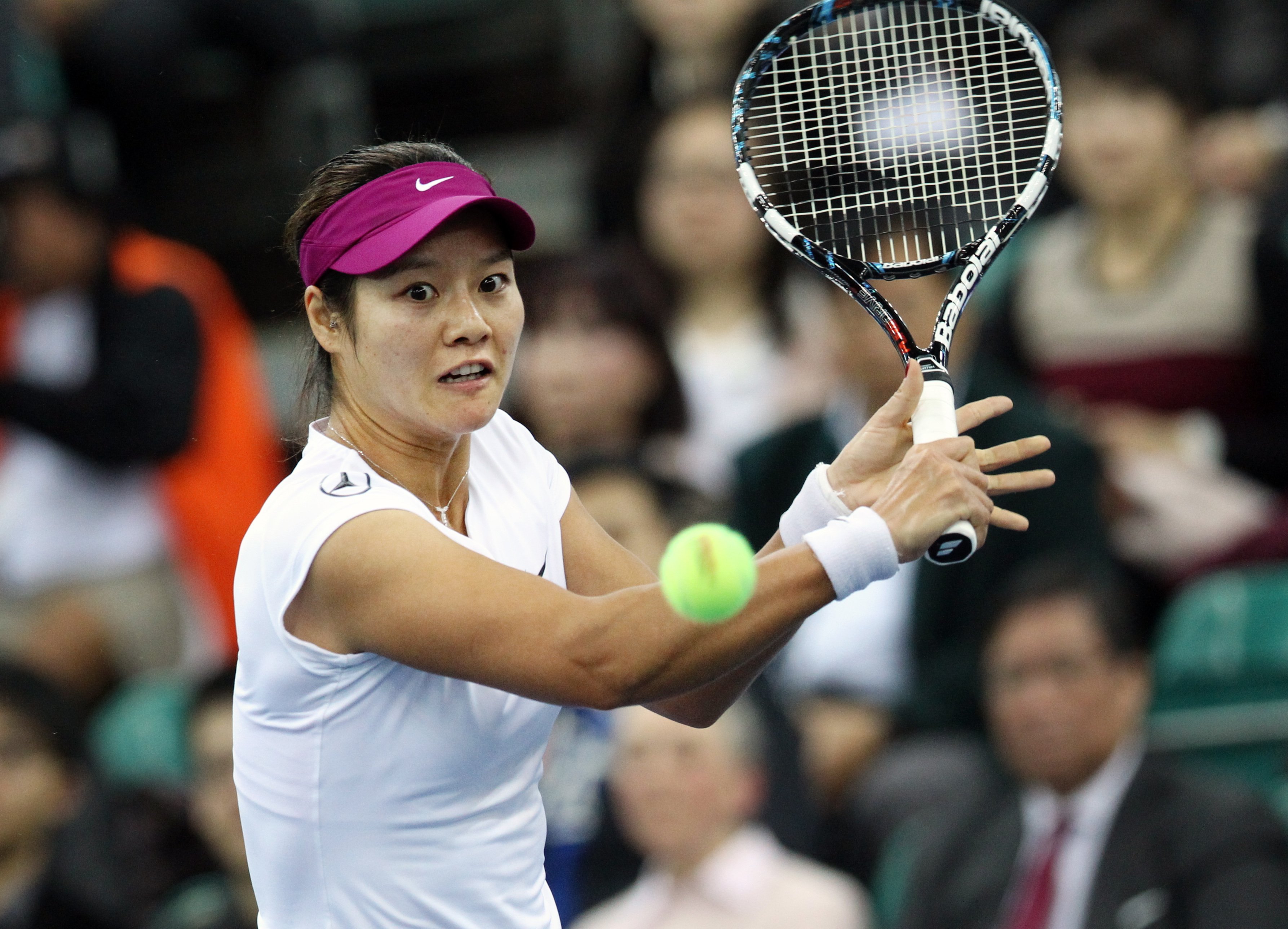 Li Na, seen in action in Hong Kong last year, gave birth to a girl she and her husband have named Alisa. Photo: Dickson Lee