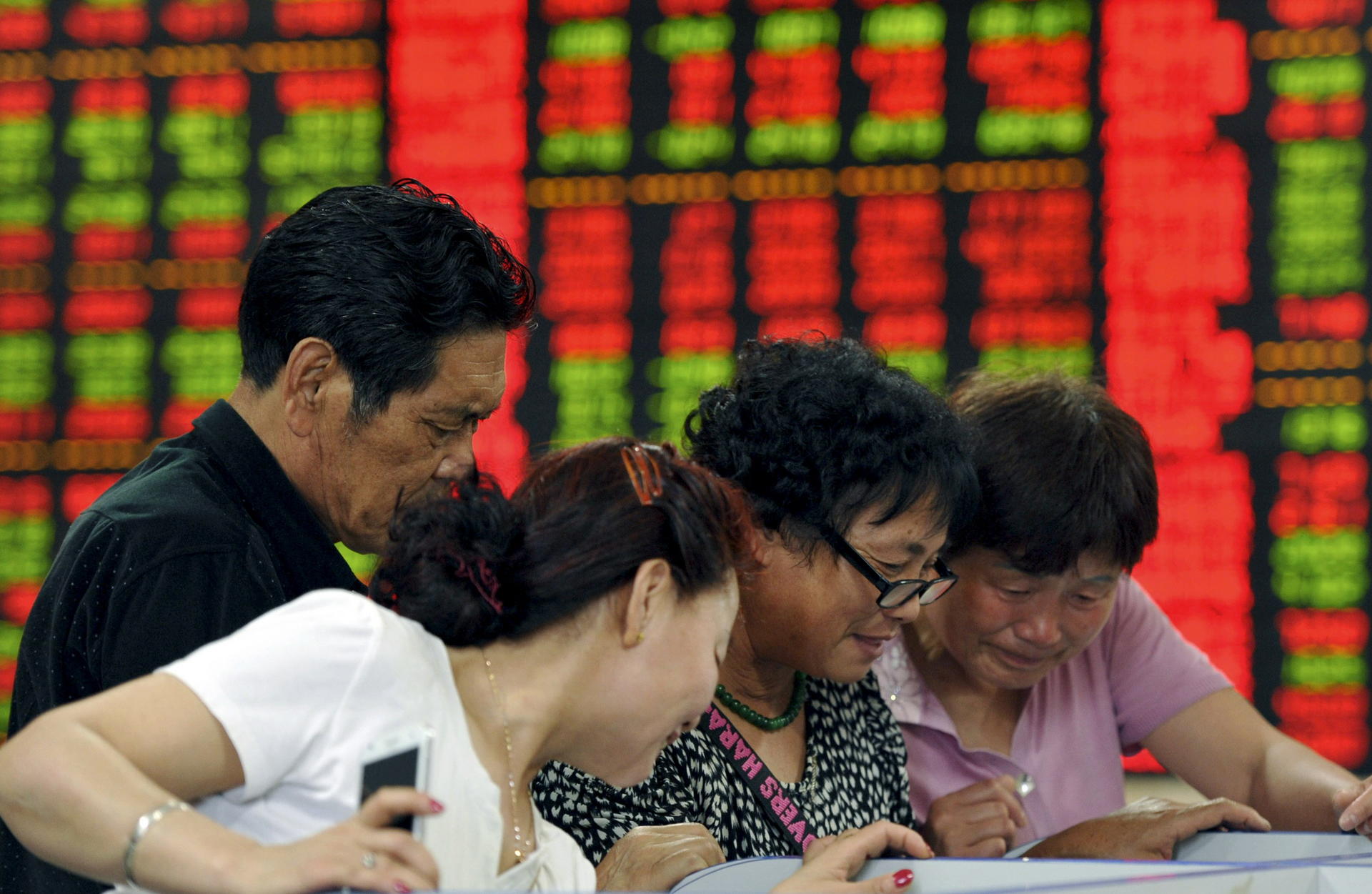 Beijing wants mainland retail investors to buy stocks to help raise the ratio of equity market capitalisation to loans. Photo: Reuters